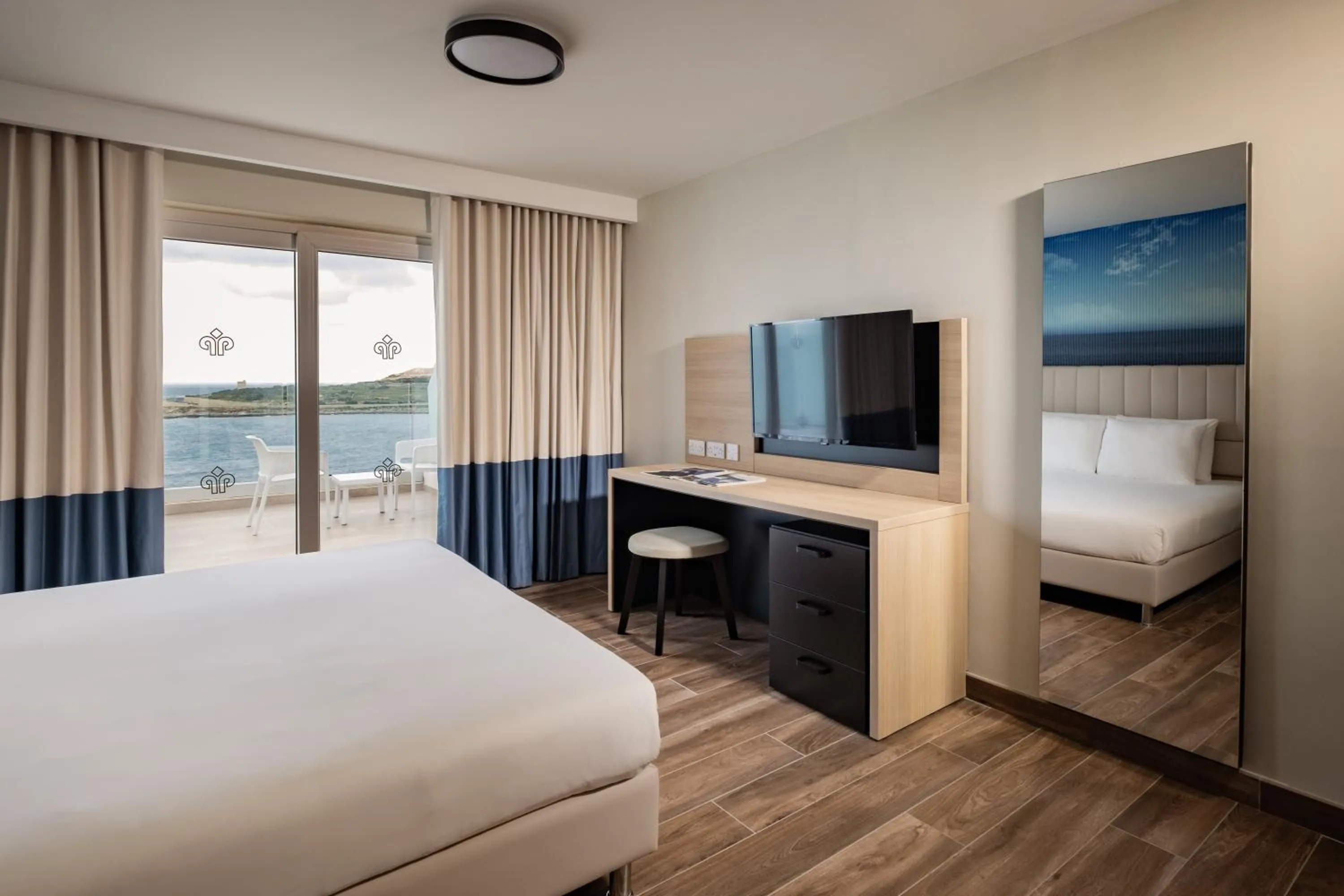 Bed in QAWRA Palace Resort & SPA