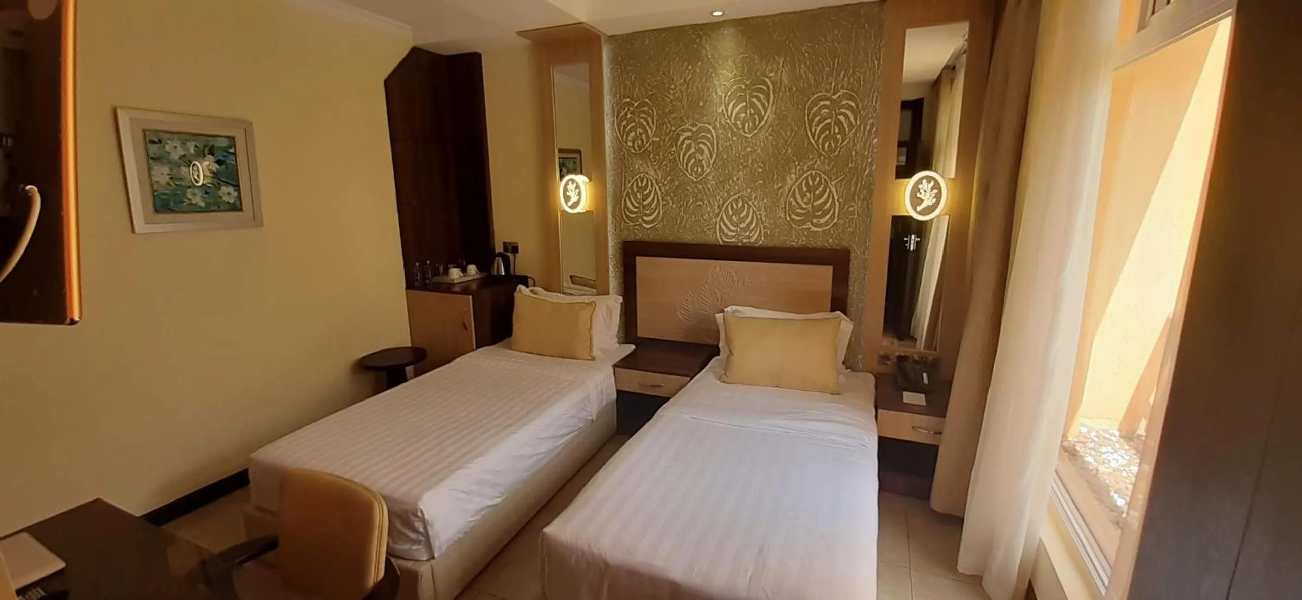 Bed in Elysian Resort