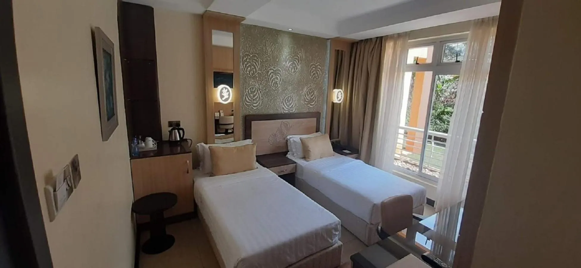 Photo of the whole room, Bed in Elysian Resort