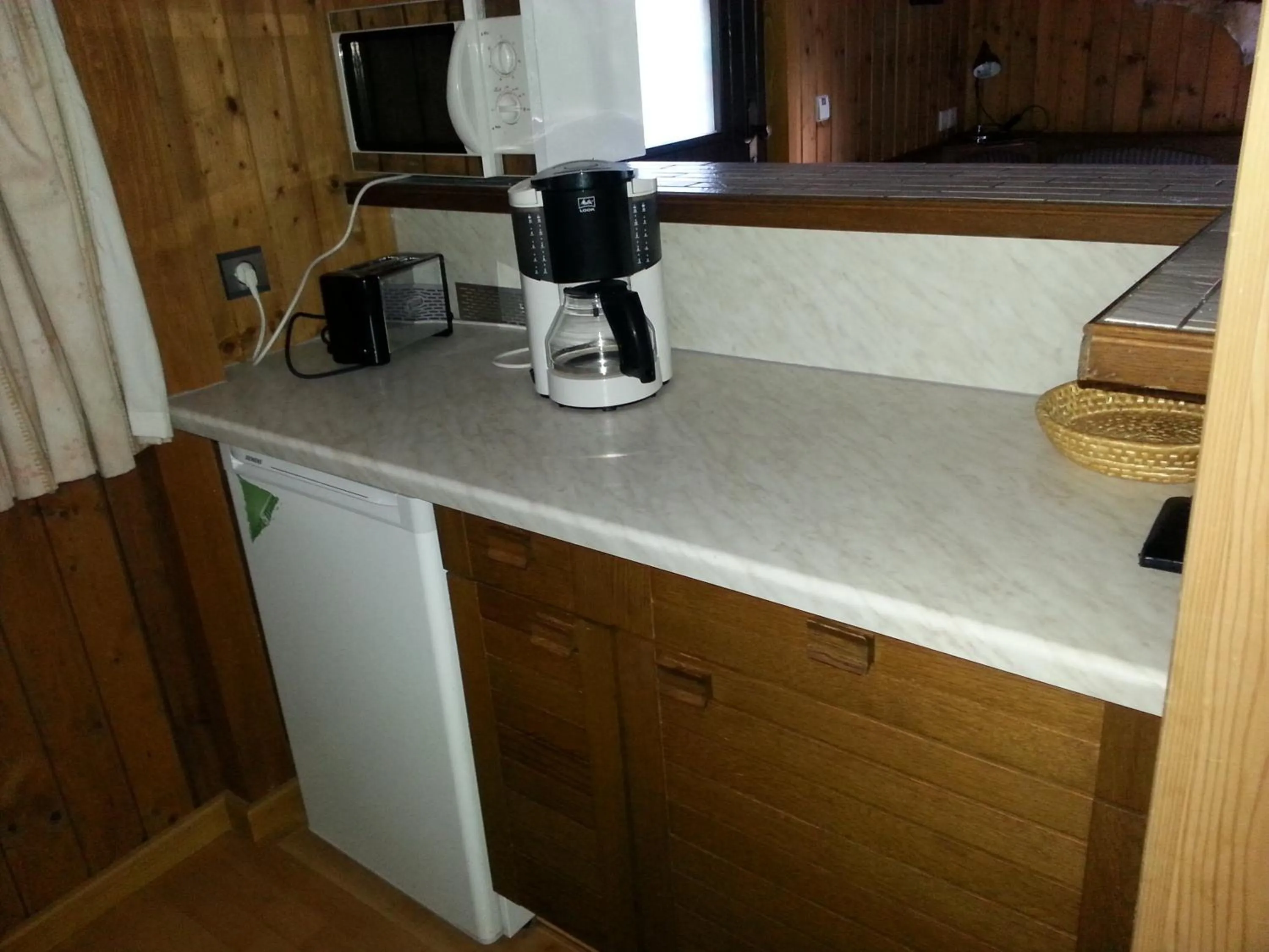 Kitchen or kitchenette in Fichtenblockhütte