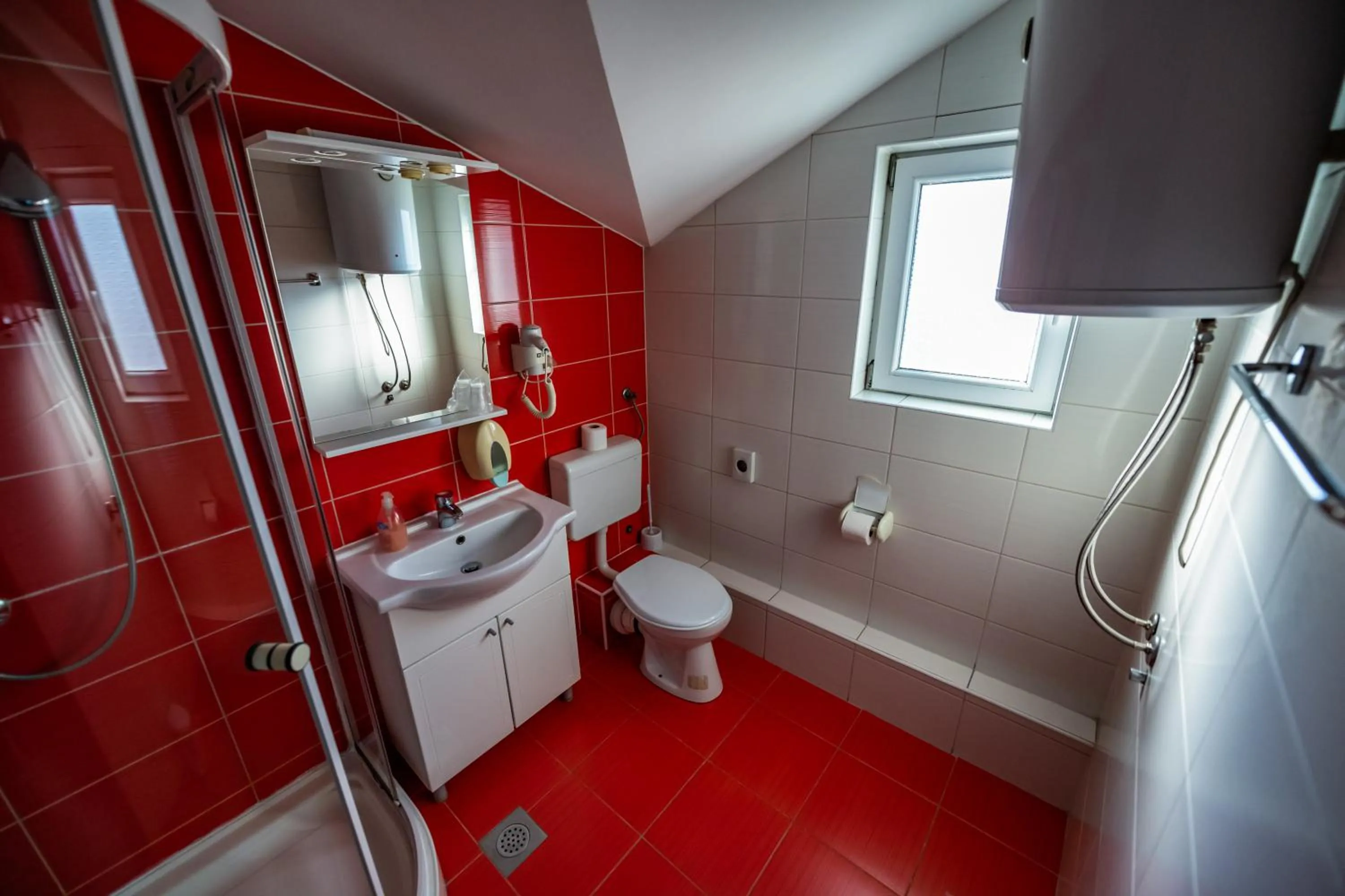 Toilet in Hotel Oasis