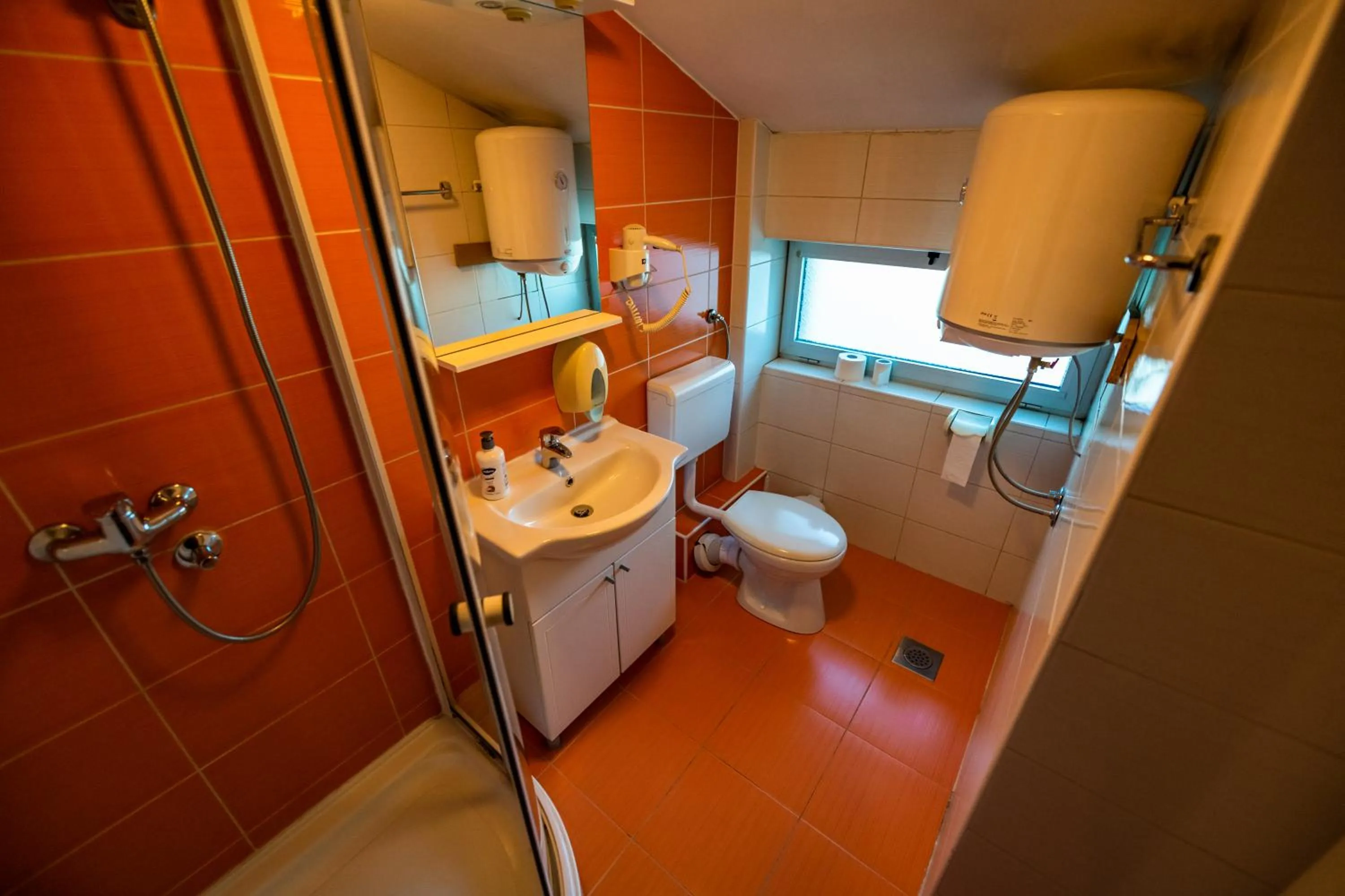 Toilet in Hotel Oasis