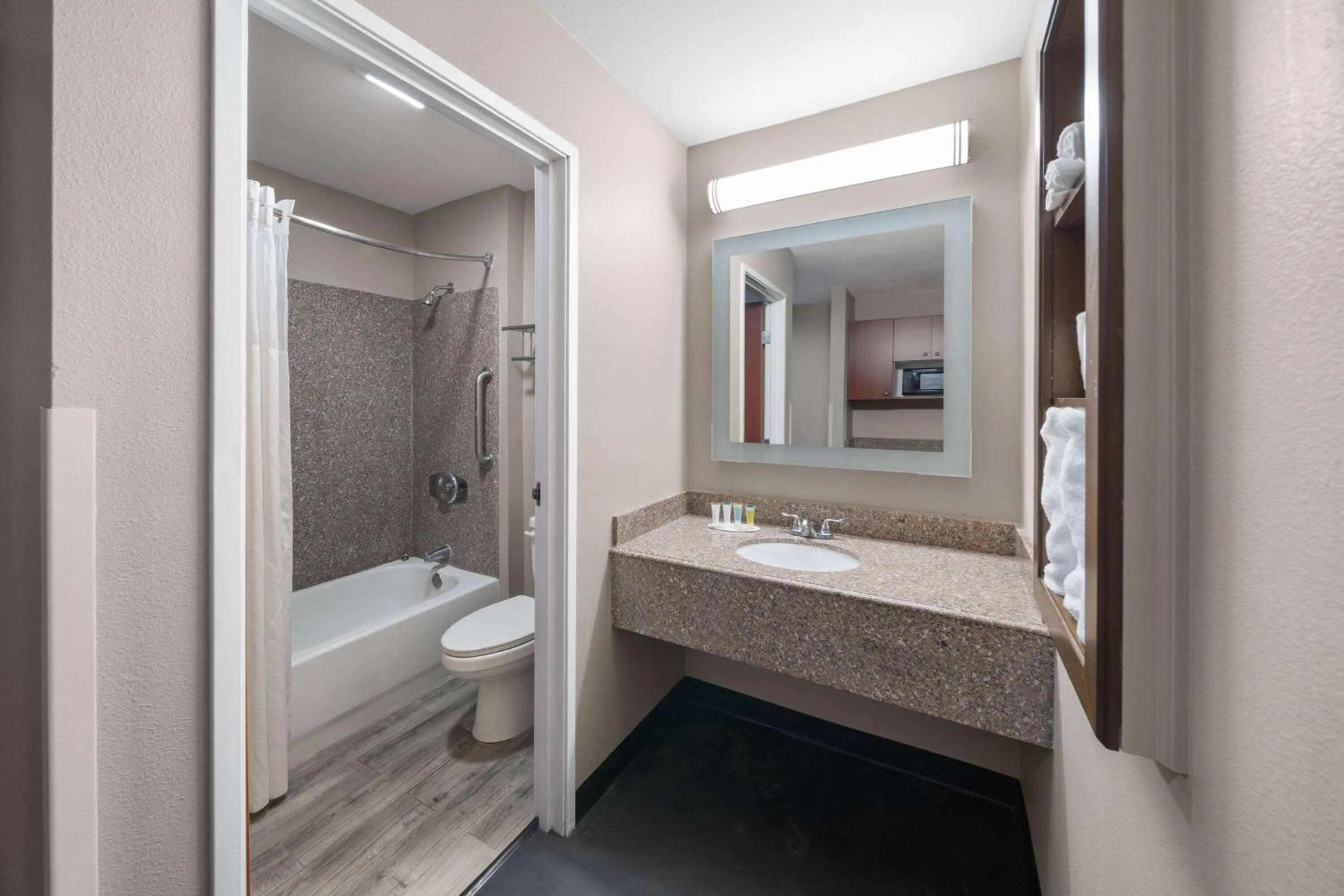 Bathroom in Super 8 by Wyndham Lubbock West