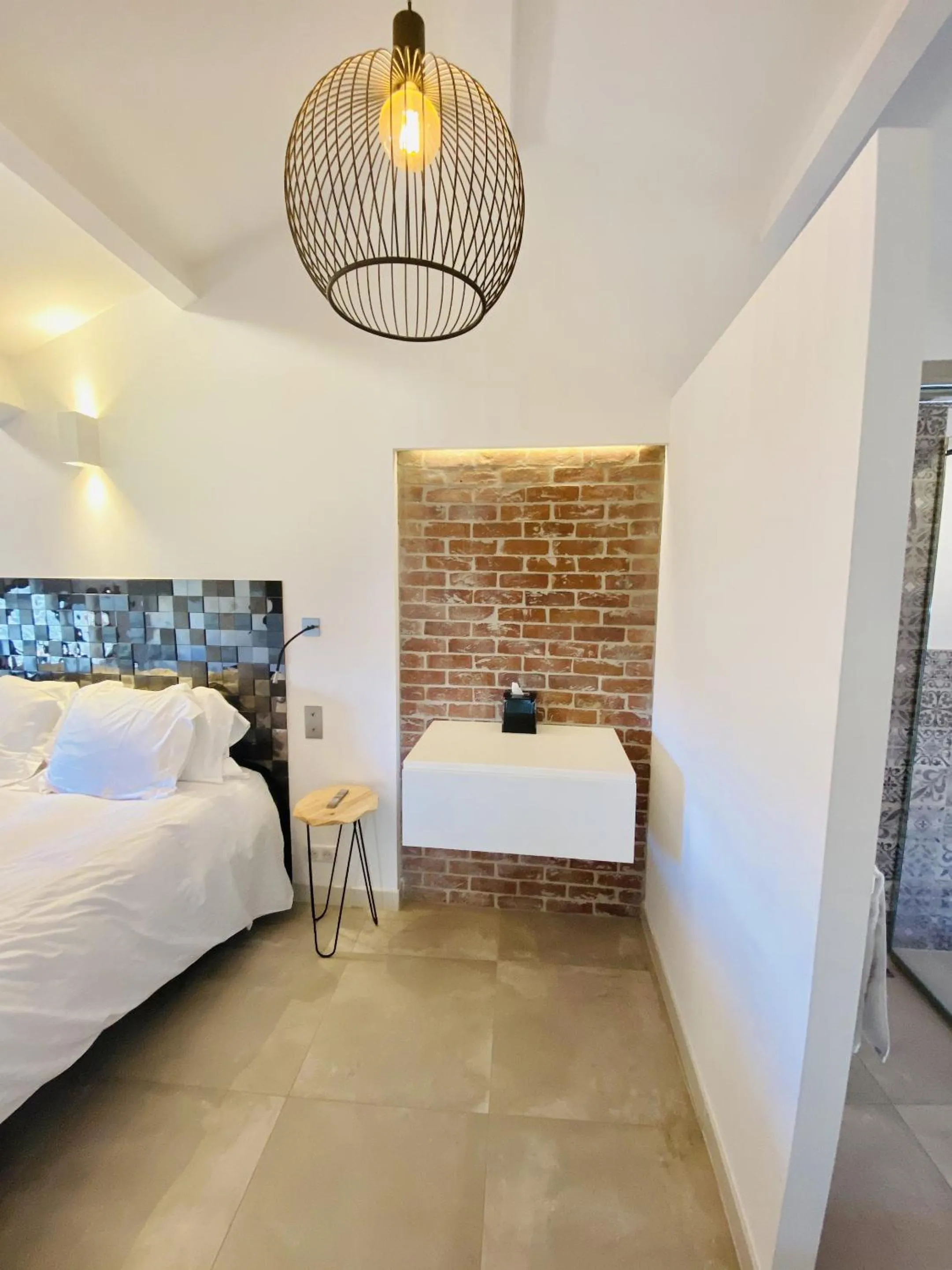 Bedroom in Hostellerie de la fontaine