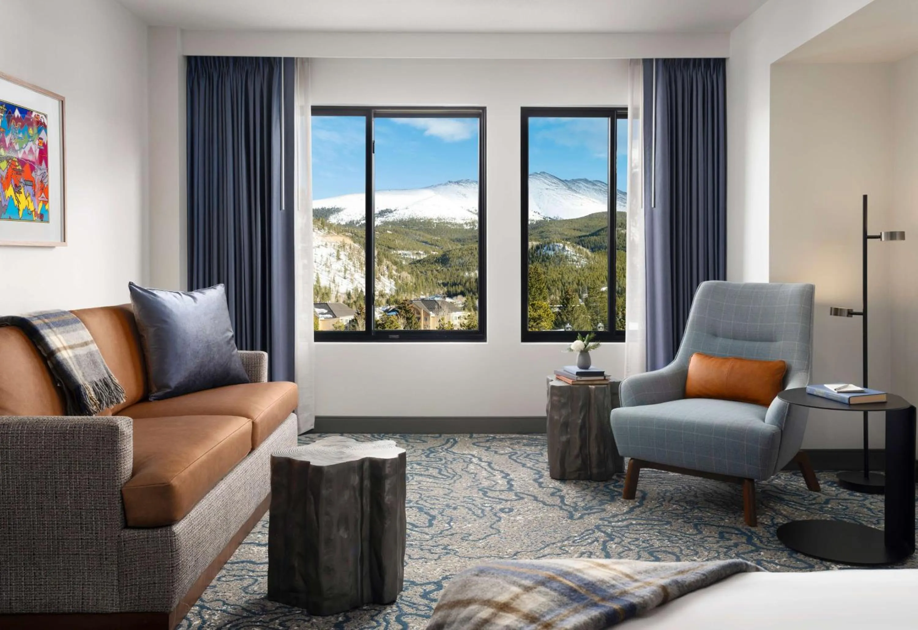 Living room in Hotel Alpenrock Breckenridge, Curio Collection by Hilton