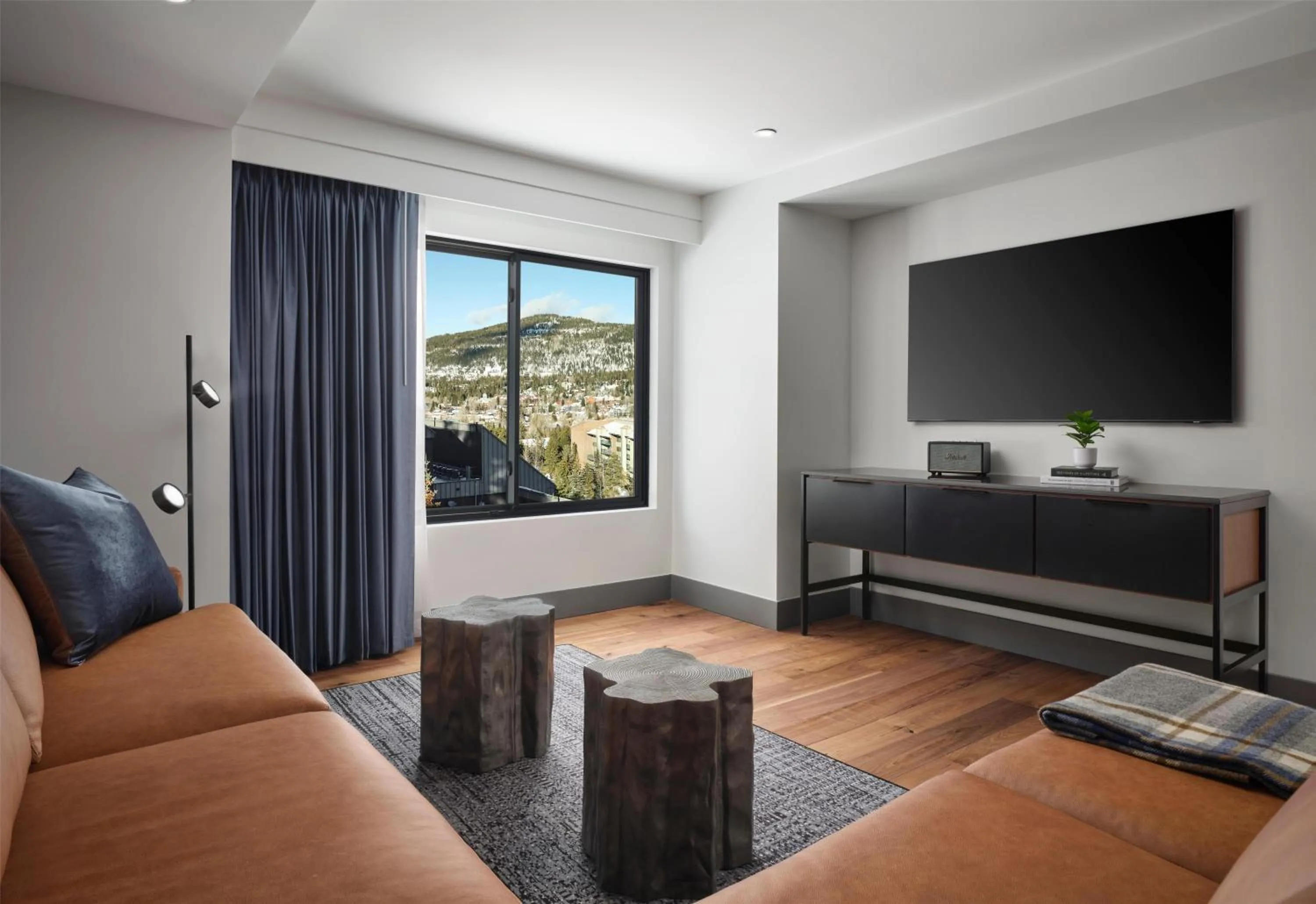 Living room in Hotel Alpenrock Breckenridge, Curio Collection by Hilton