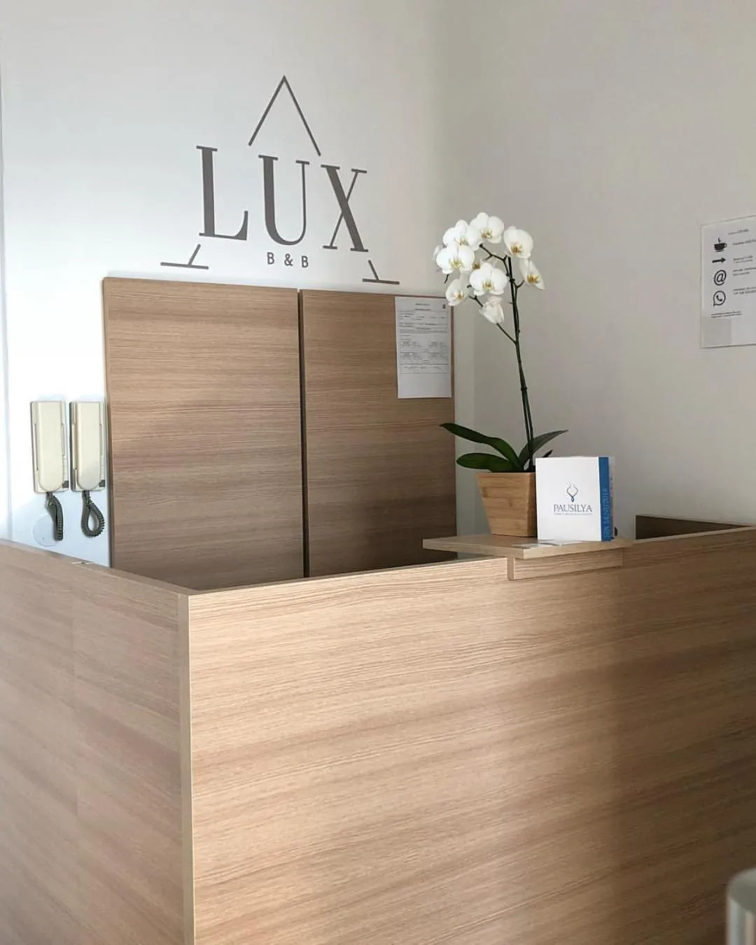 Property logo or sign in Lux