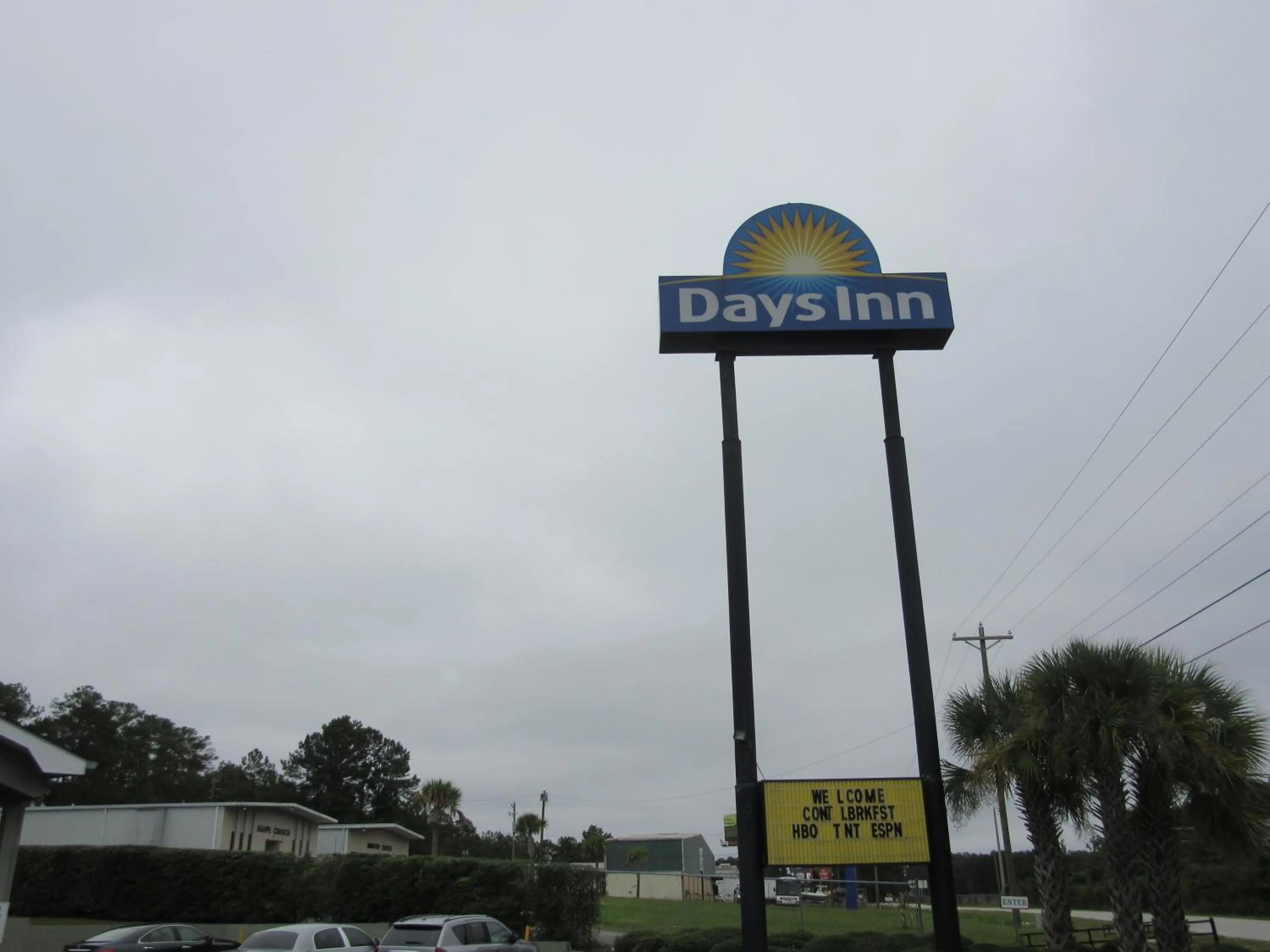 Property logo or sign in Days Inn by Wyndham Columbia NE Fort Jackson