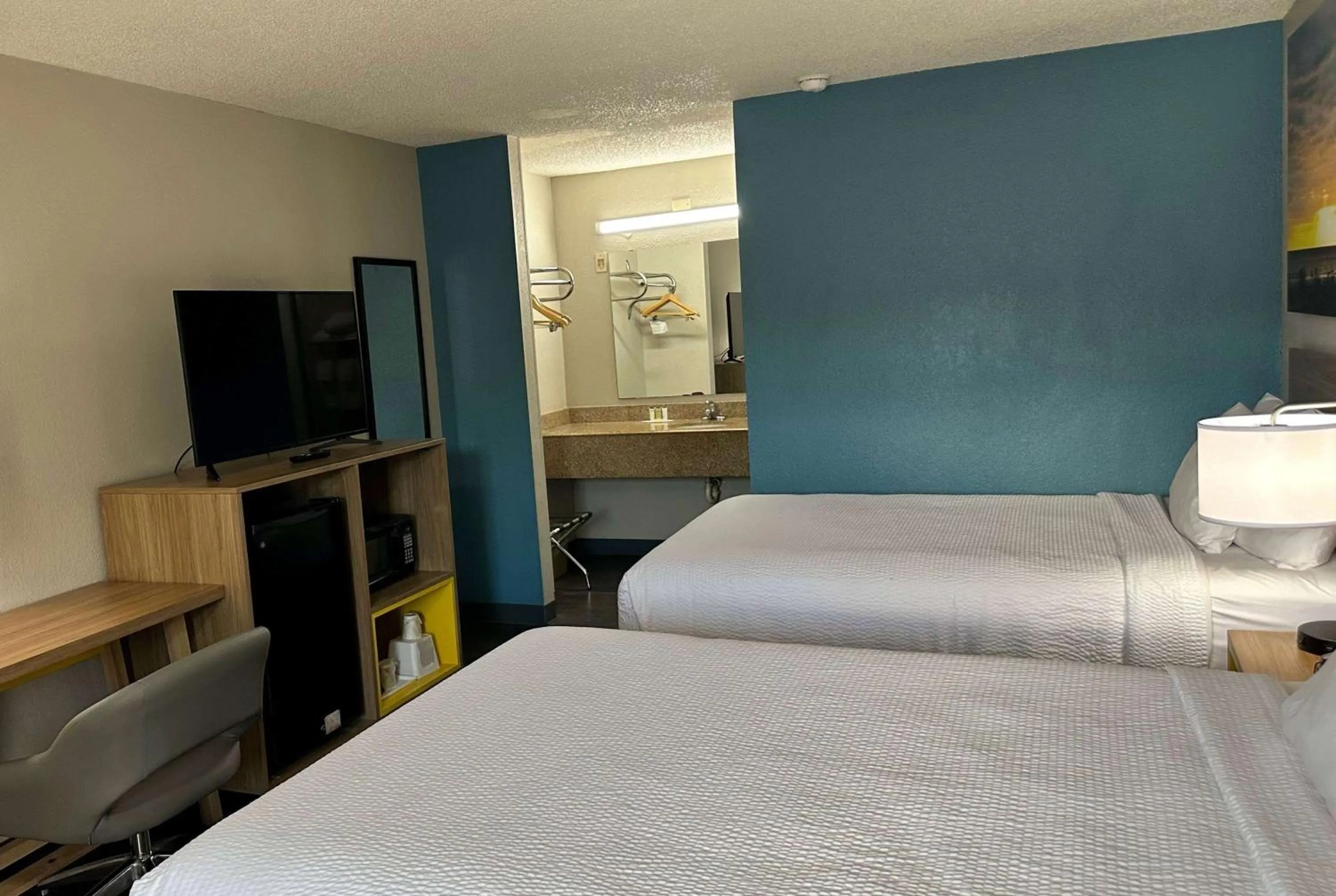 Photo of the whole room, Bed in Days Inn by Wyndham Columbia NE Fort Jackson