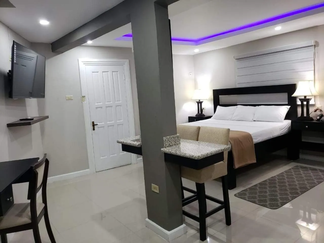 Bed in Christar Villas Hotel