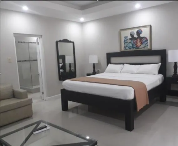 Bed in Christar Villas Hotel