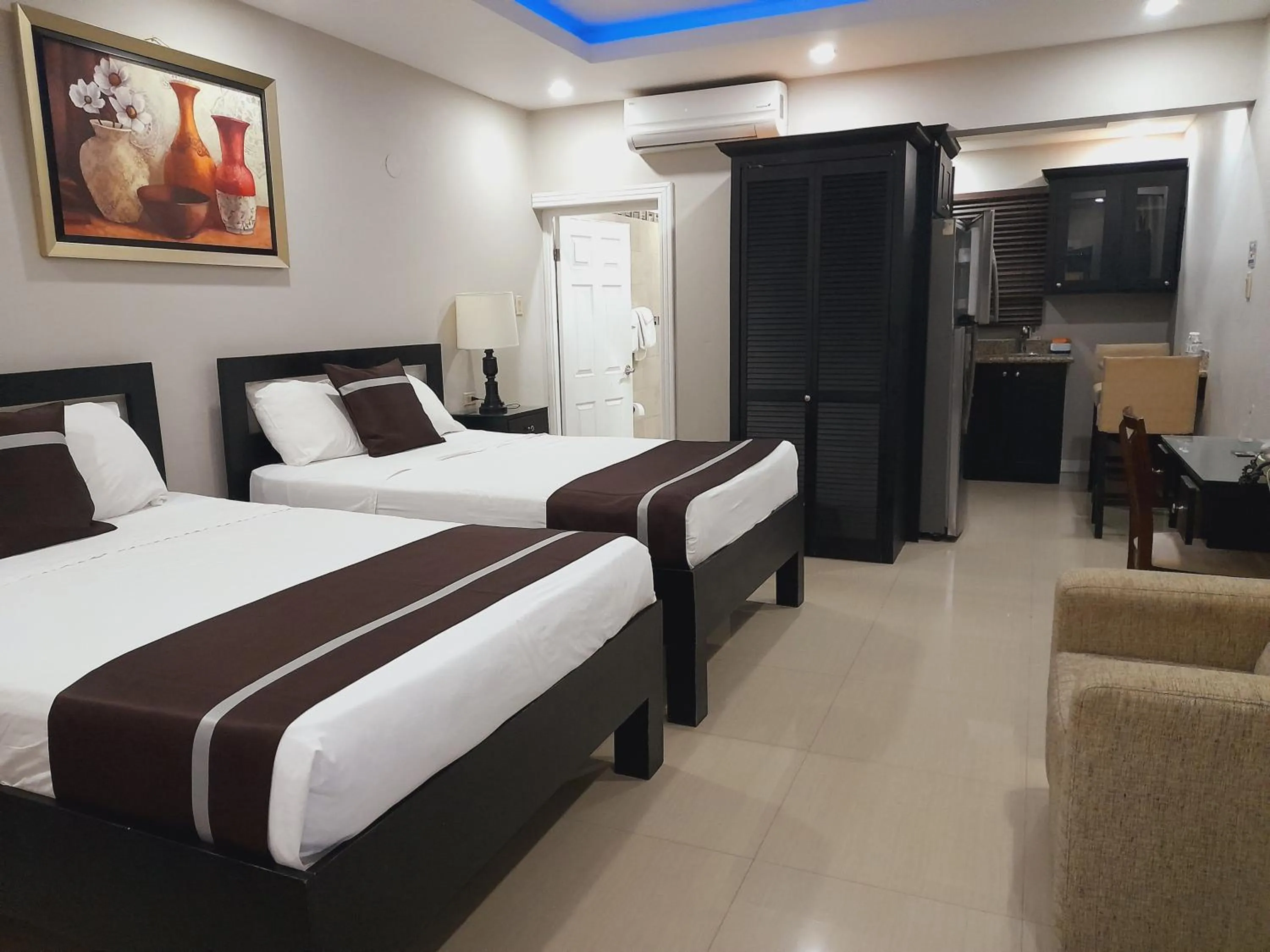 Bed in Christar Villas Hotel