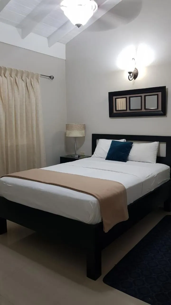 Bed in Christar Villas Hotel