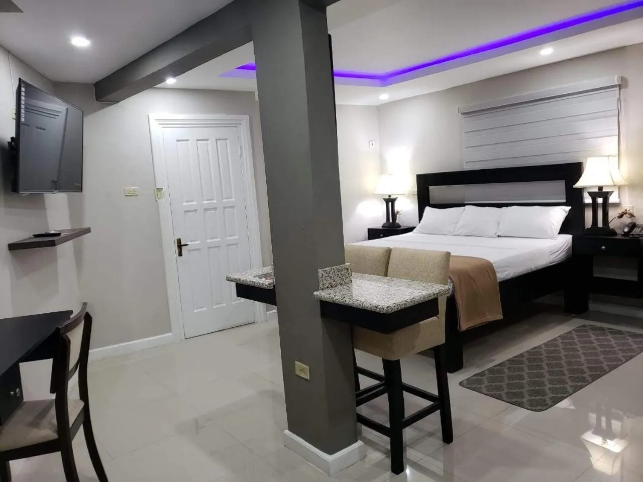 Bed in Christar Villas Hotel