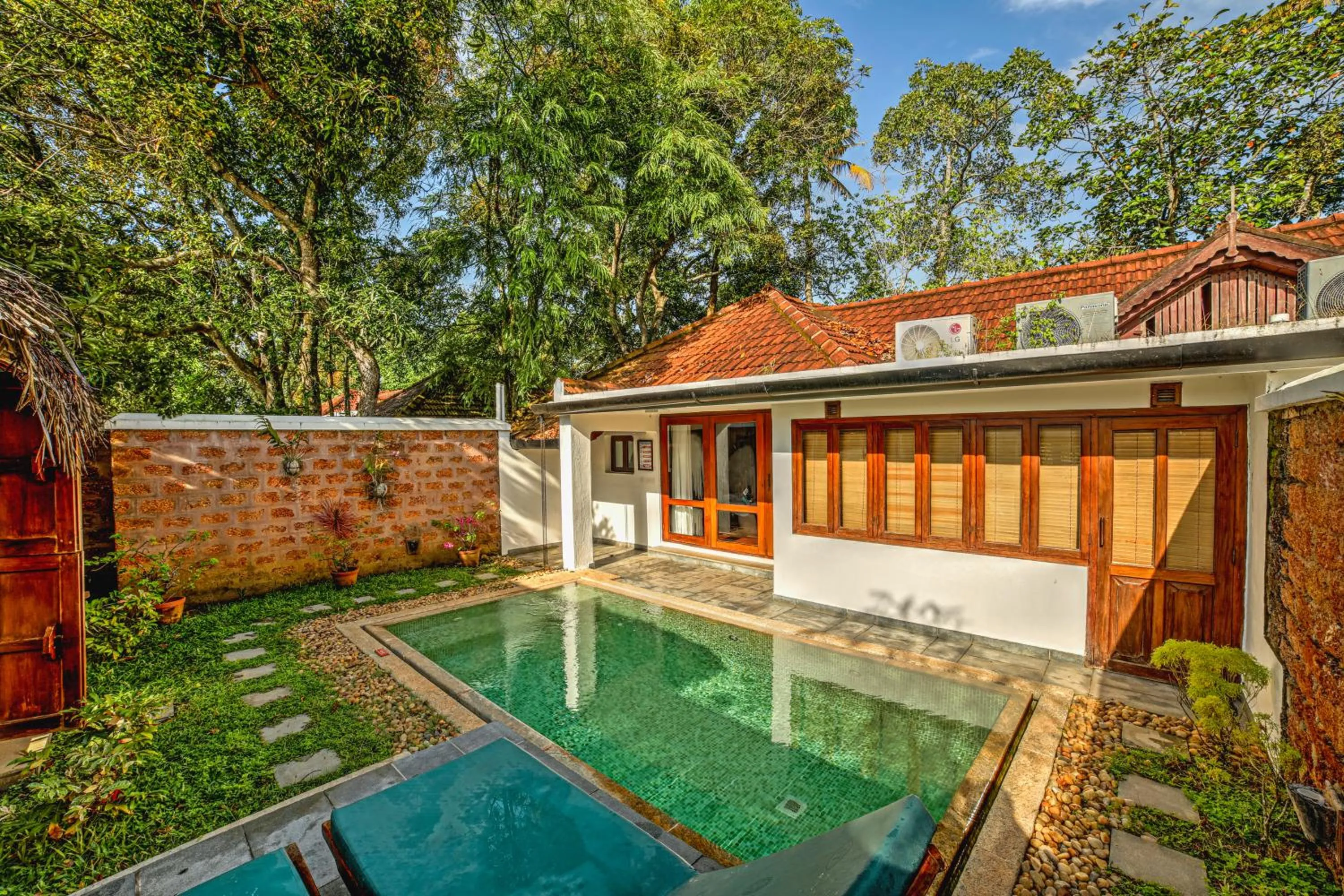 Swimming pool in Coconut Lagoon Kumarakom - A CGH Earth Experience