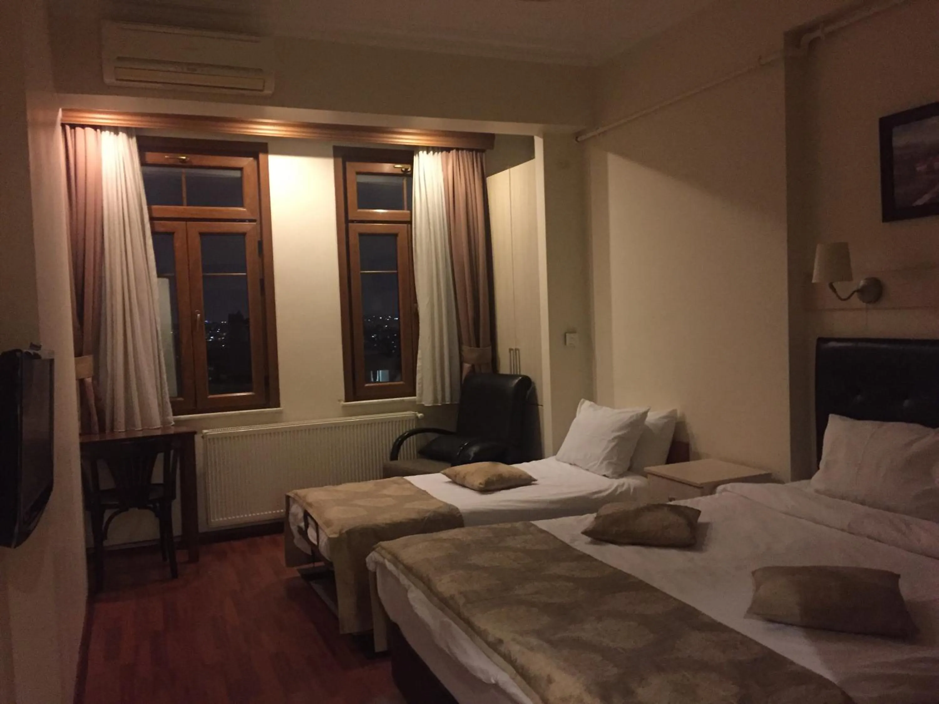 Bed in Taksim House Suites
