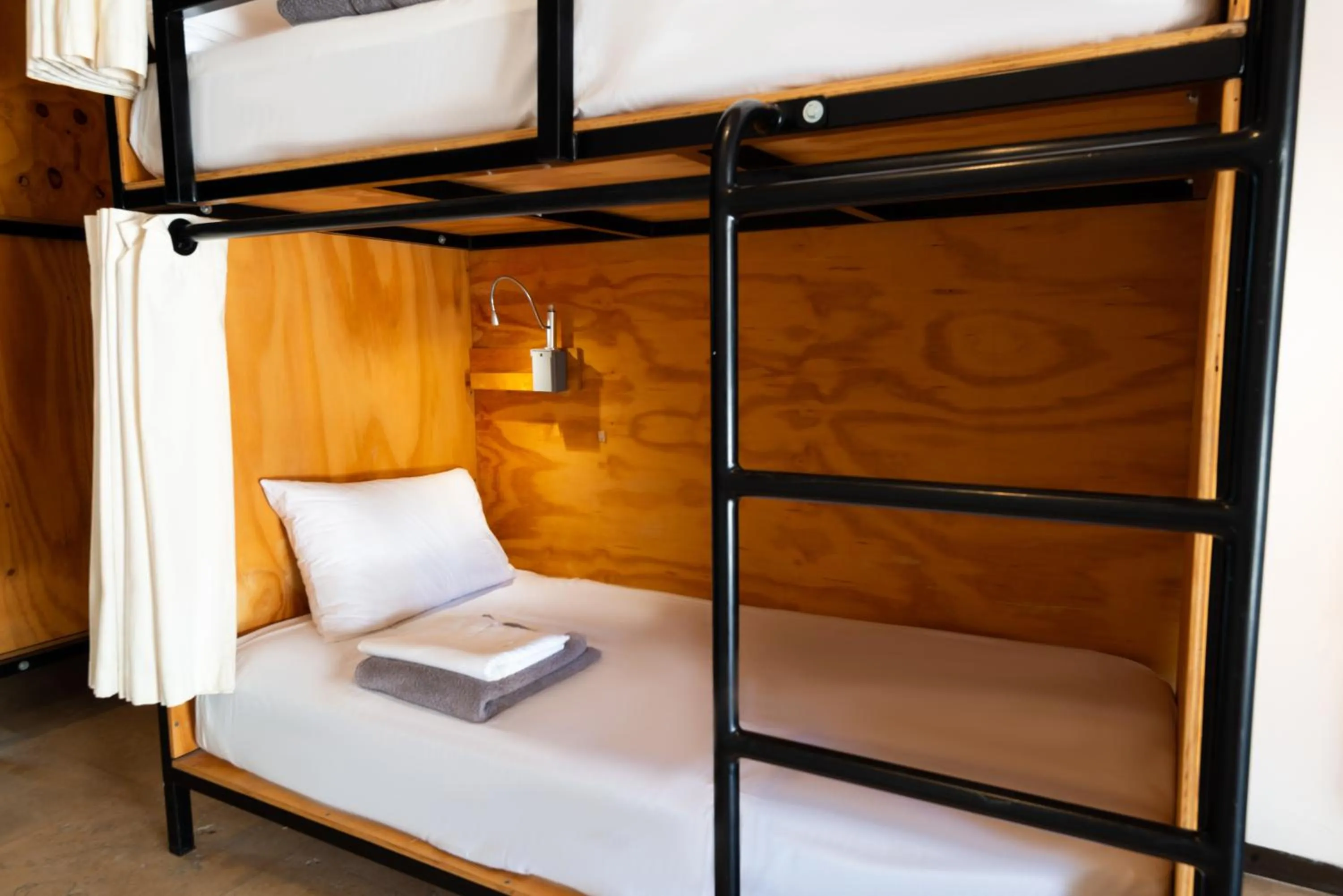 Bed in Mayan Monkey Los Cabos - Social Hotel