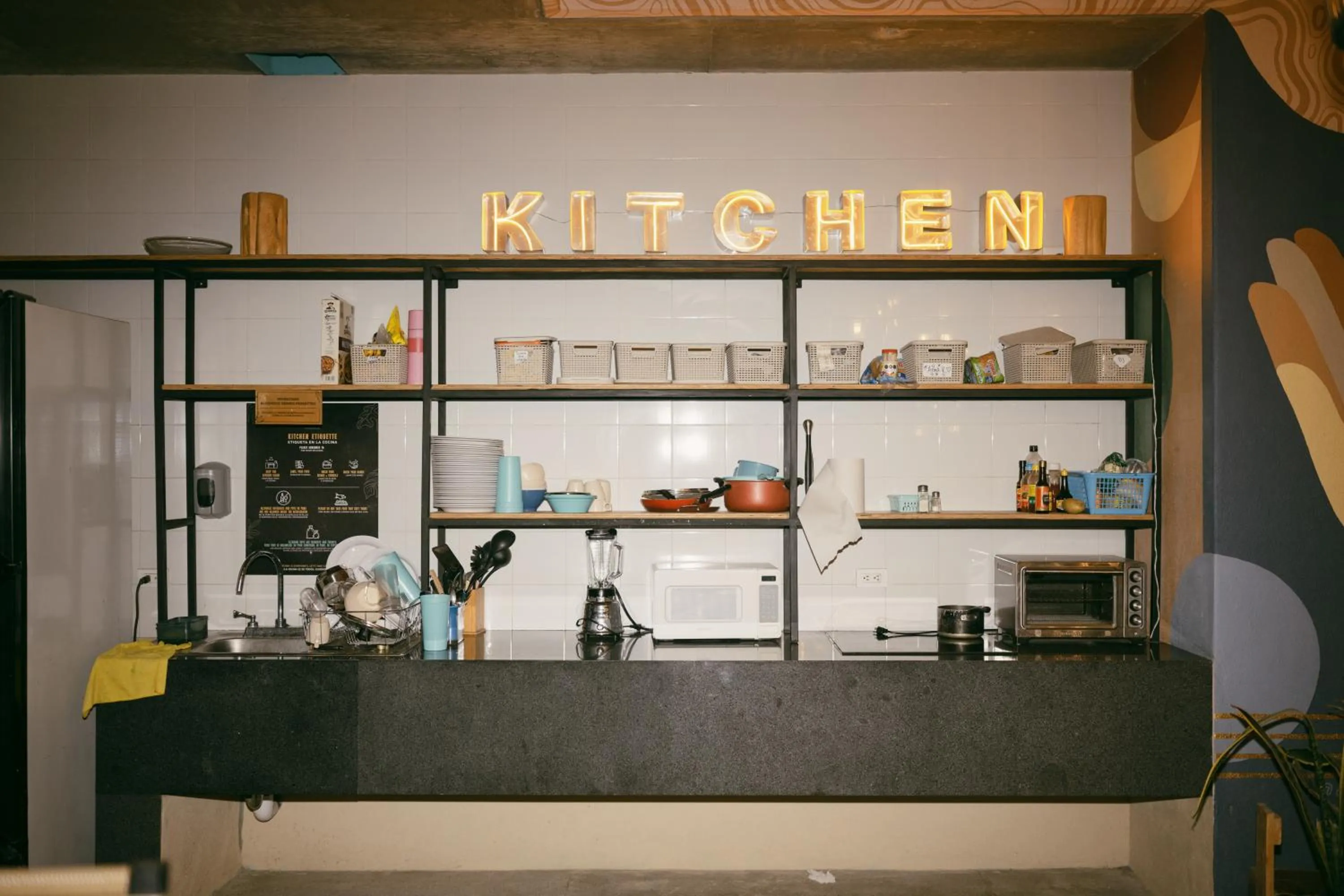 Communal kitchen in Mayan Monkey Los Cabos - Social Hotel