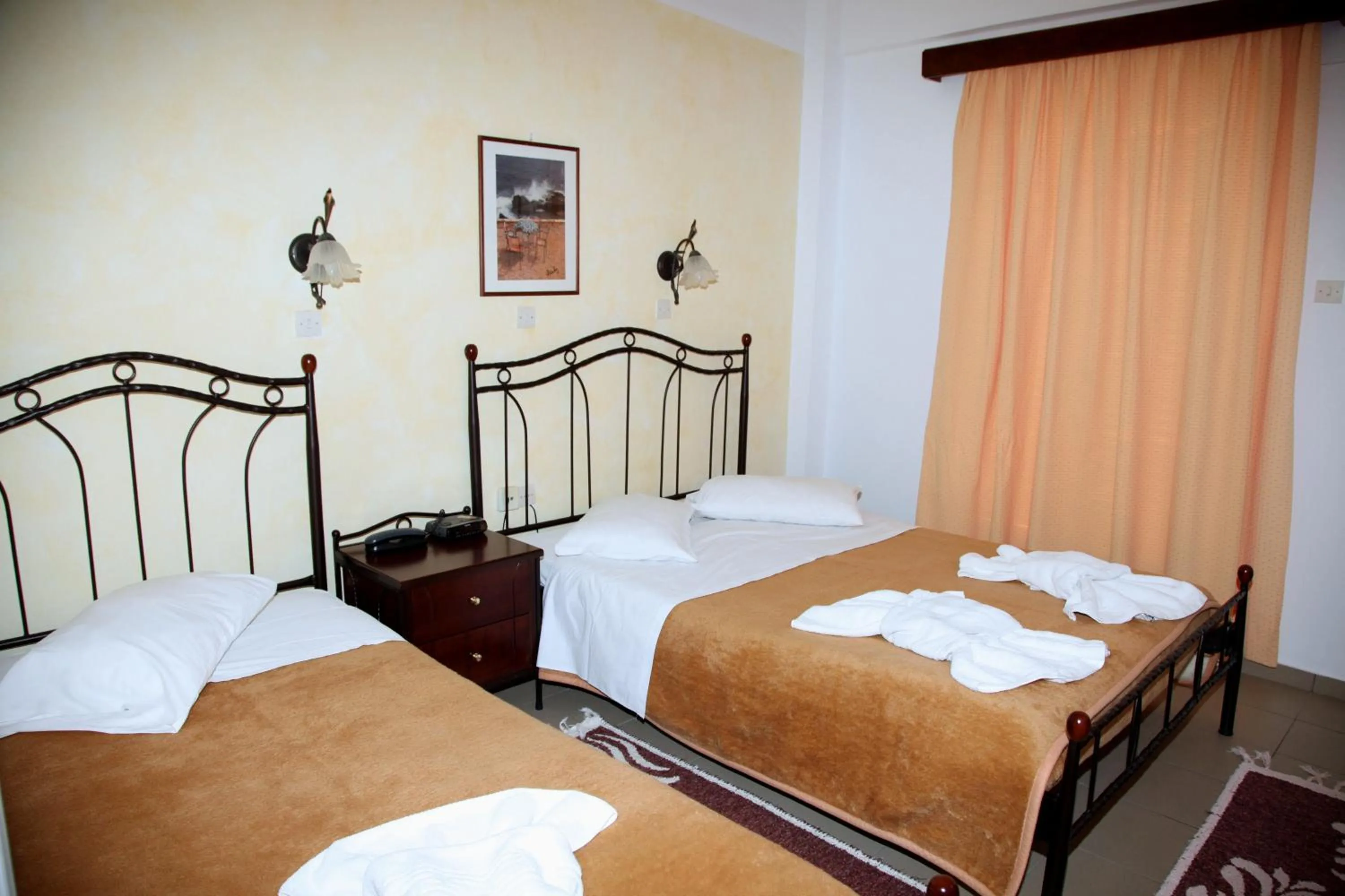 Bed in Nikolas Hotel