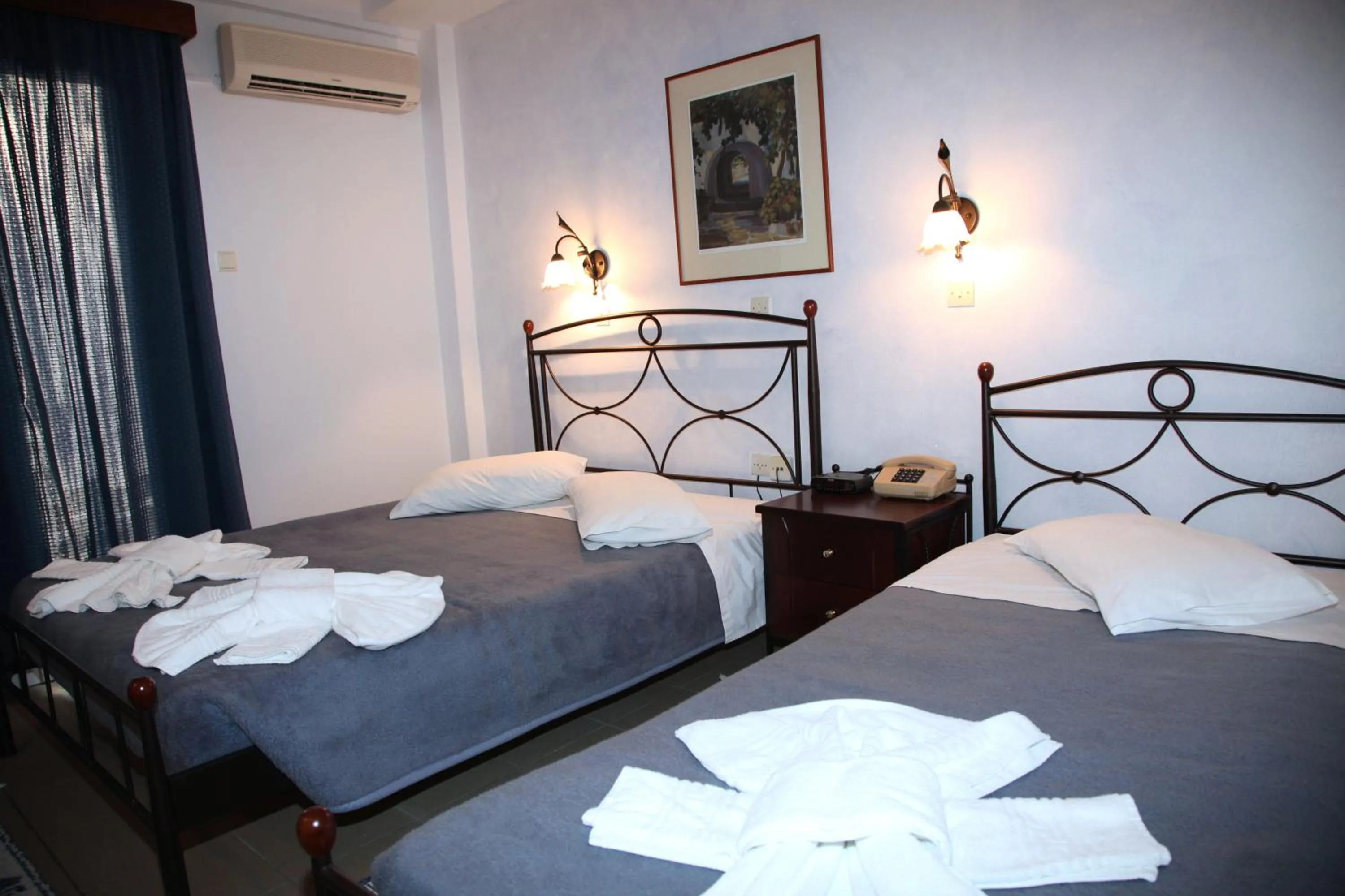 Bed in Nikolas Hotel