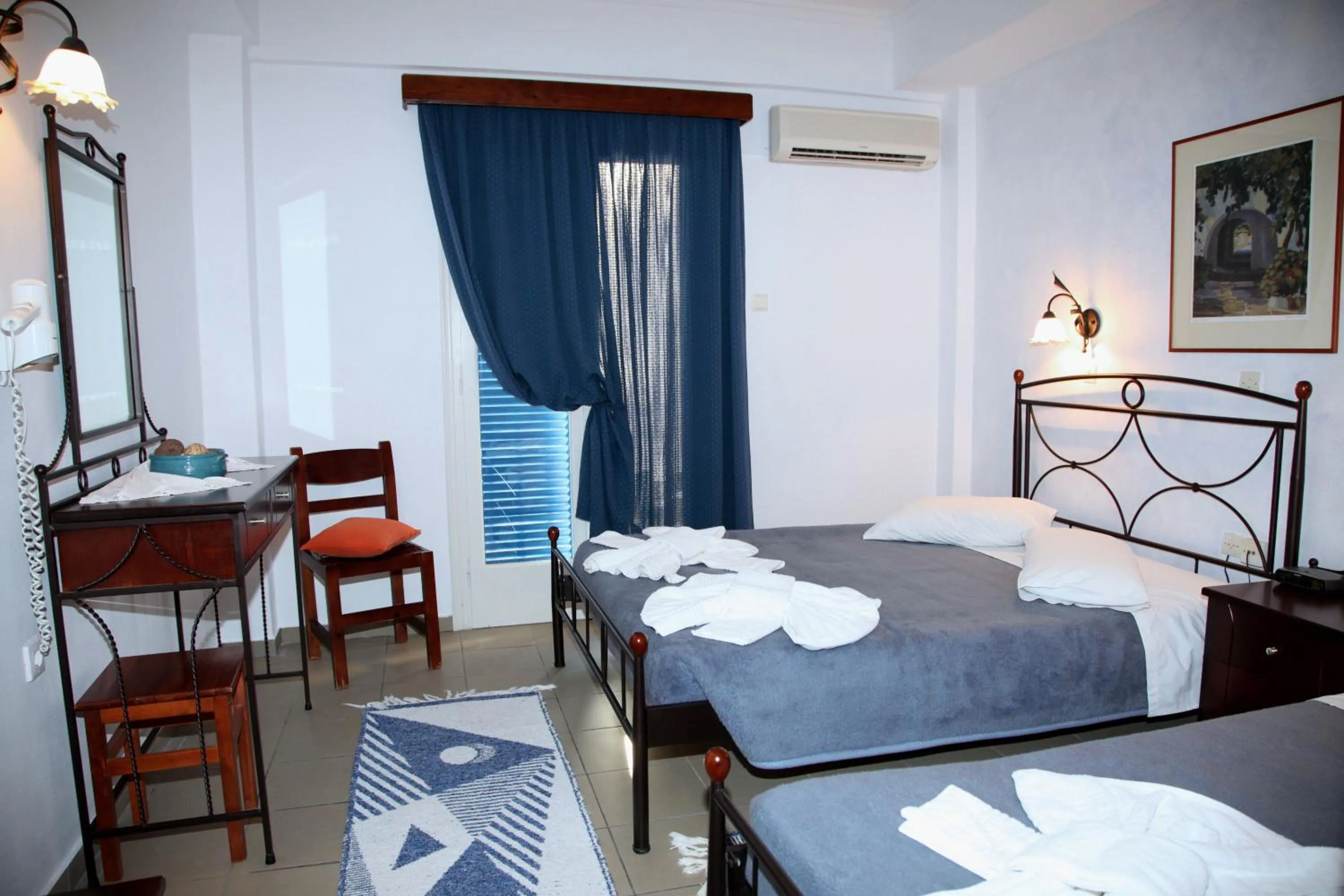 Bed in Nikolas Hotel