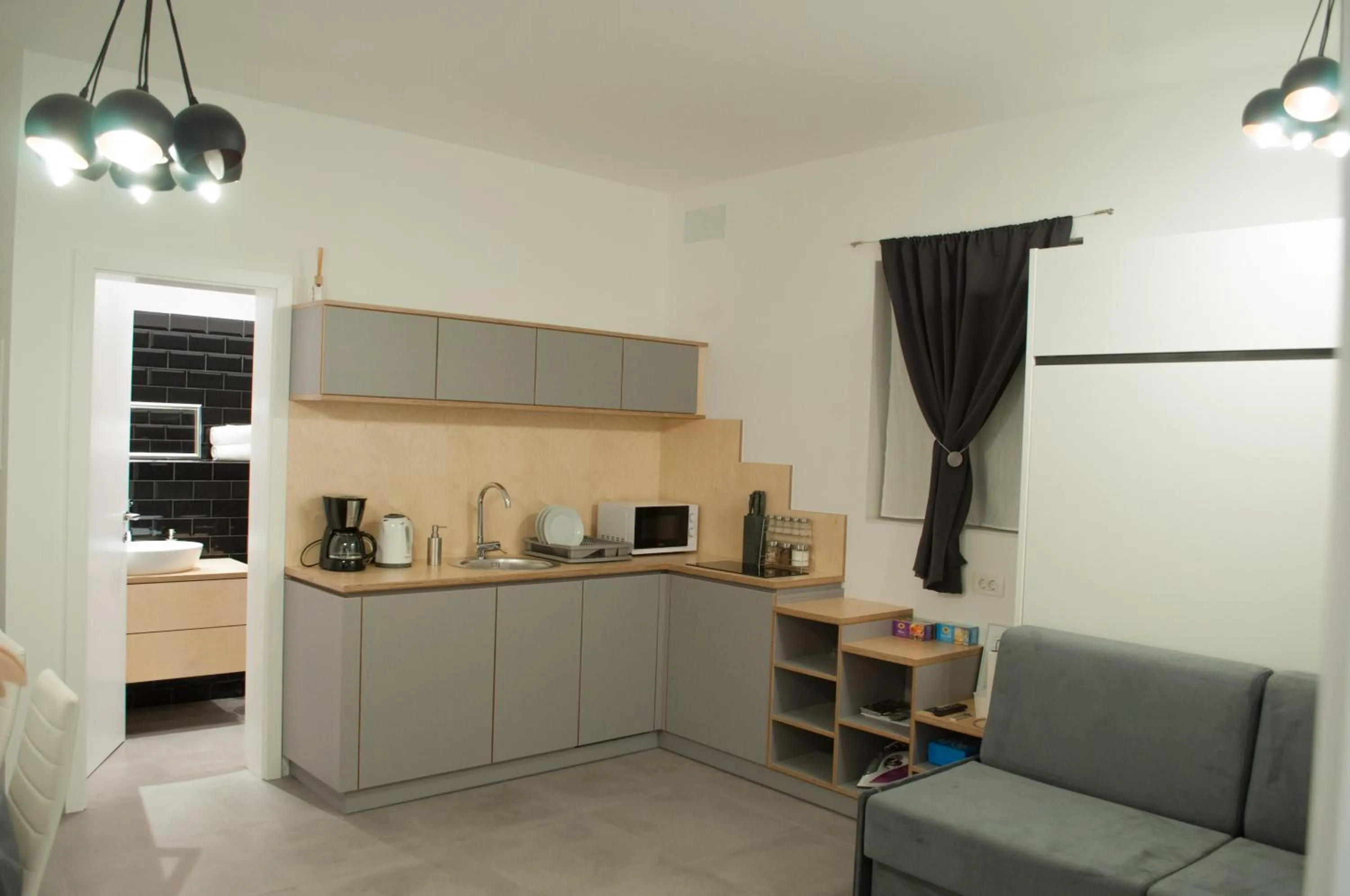 Kitchen or kitchenette in Pekarna apartments