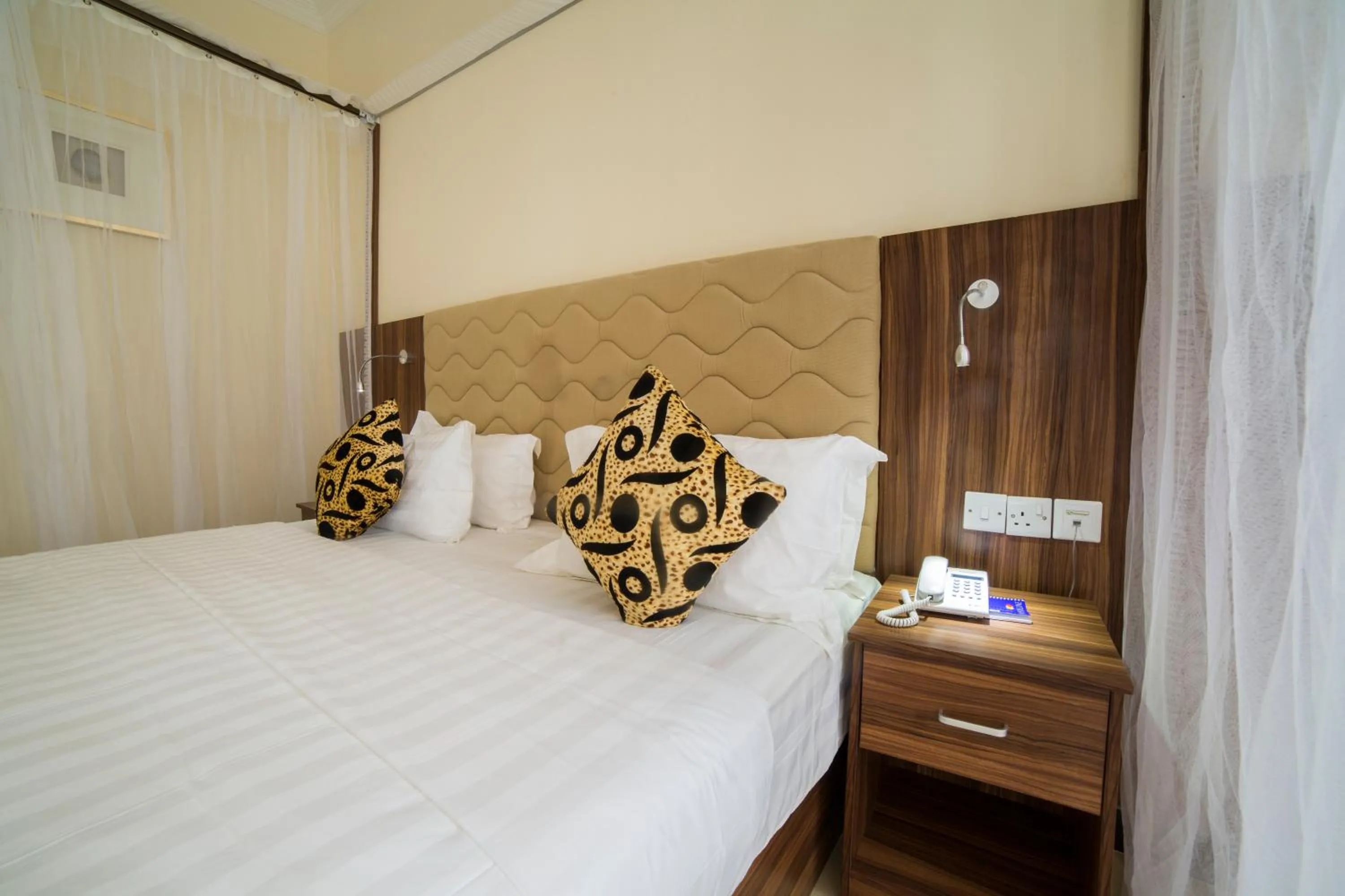 Bed in Spice Palace Hotel