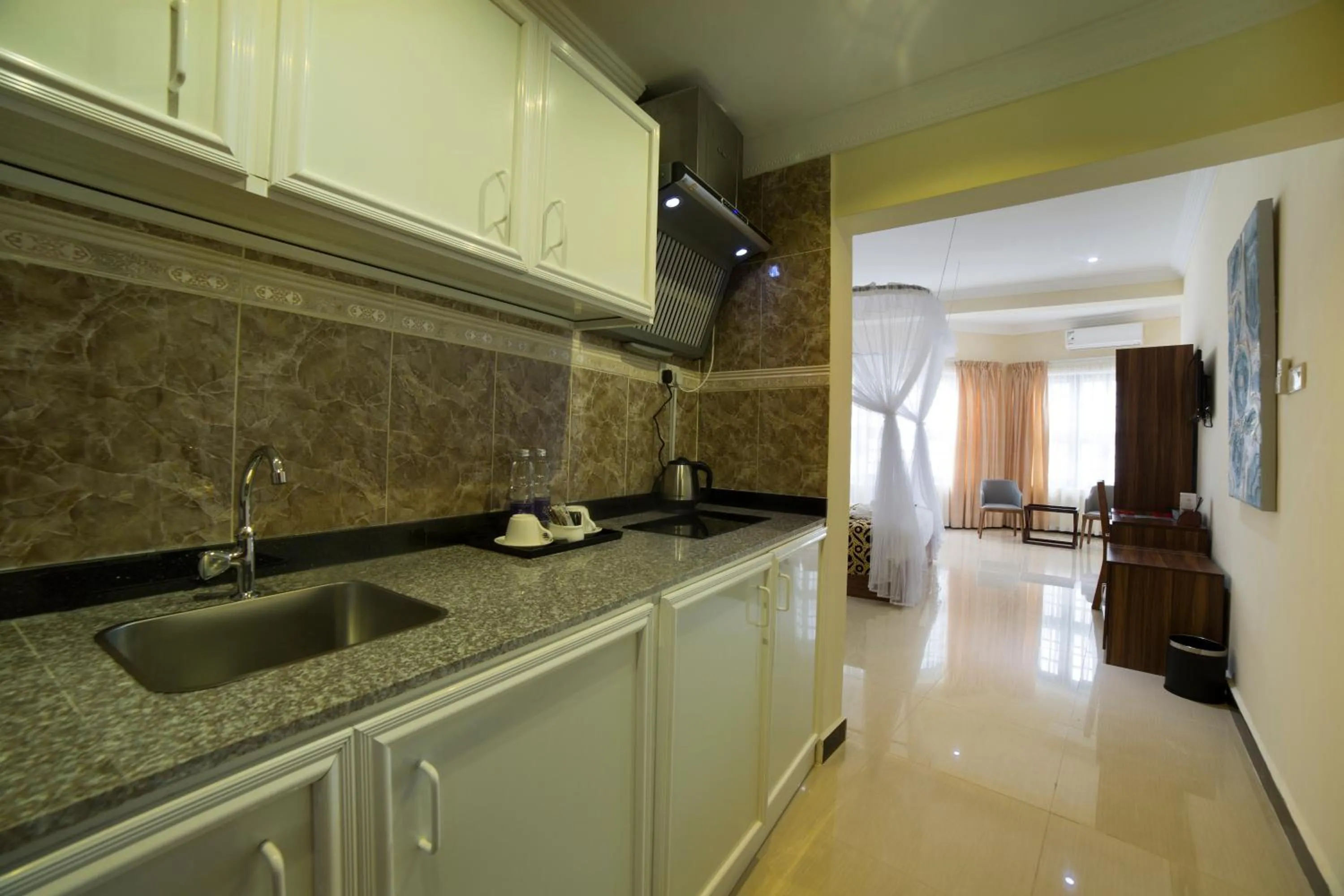 Kitchen or kitchenette in Spice Palace Hotel