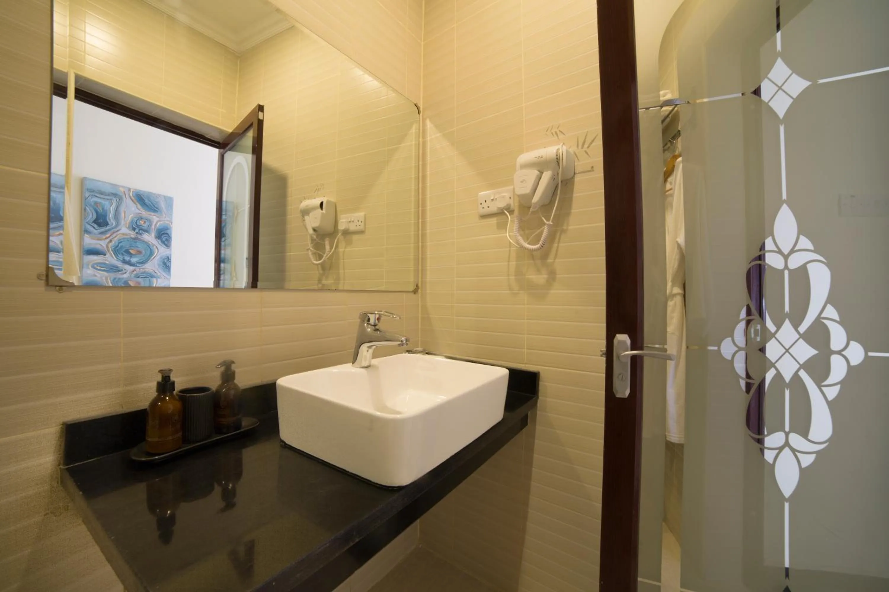 Bathroom in Spice Palace Hotel