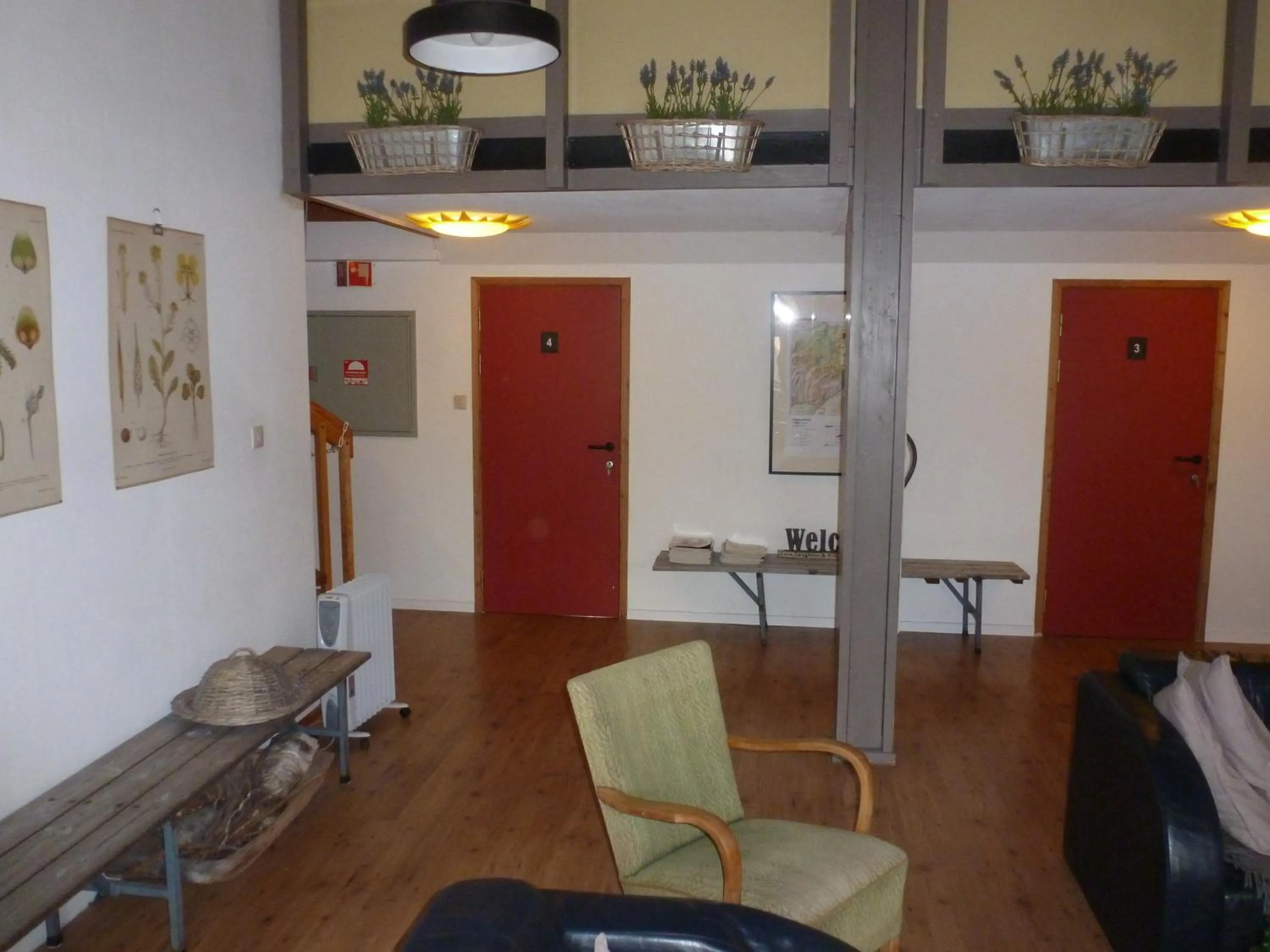 Communal lounge/ TV room in Gjesteheim Havdal