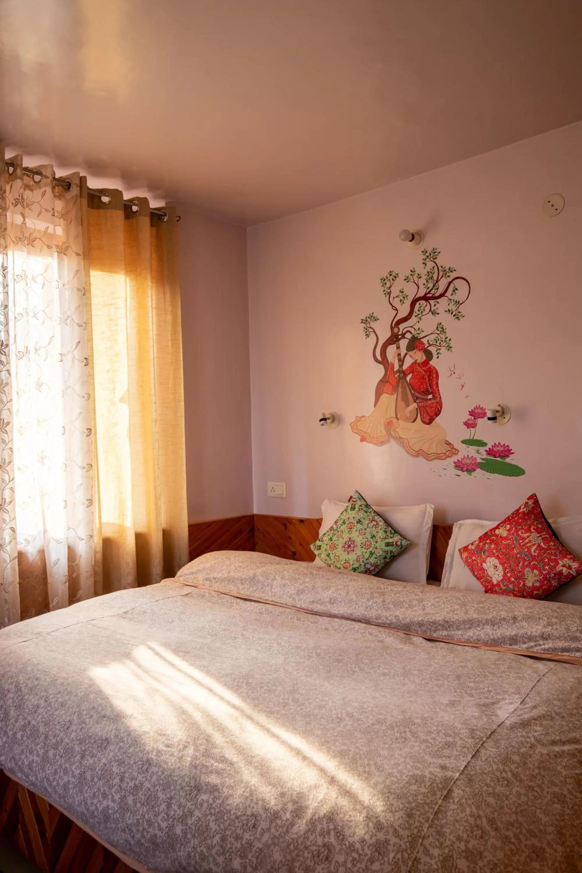 Bed in Ishan Log Huts-A boutique home stay