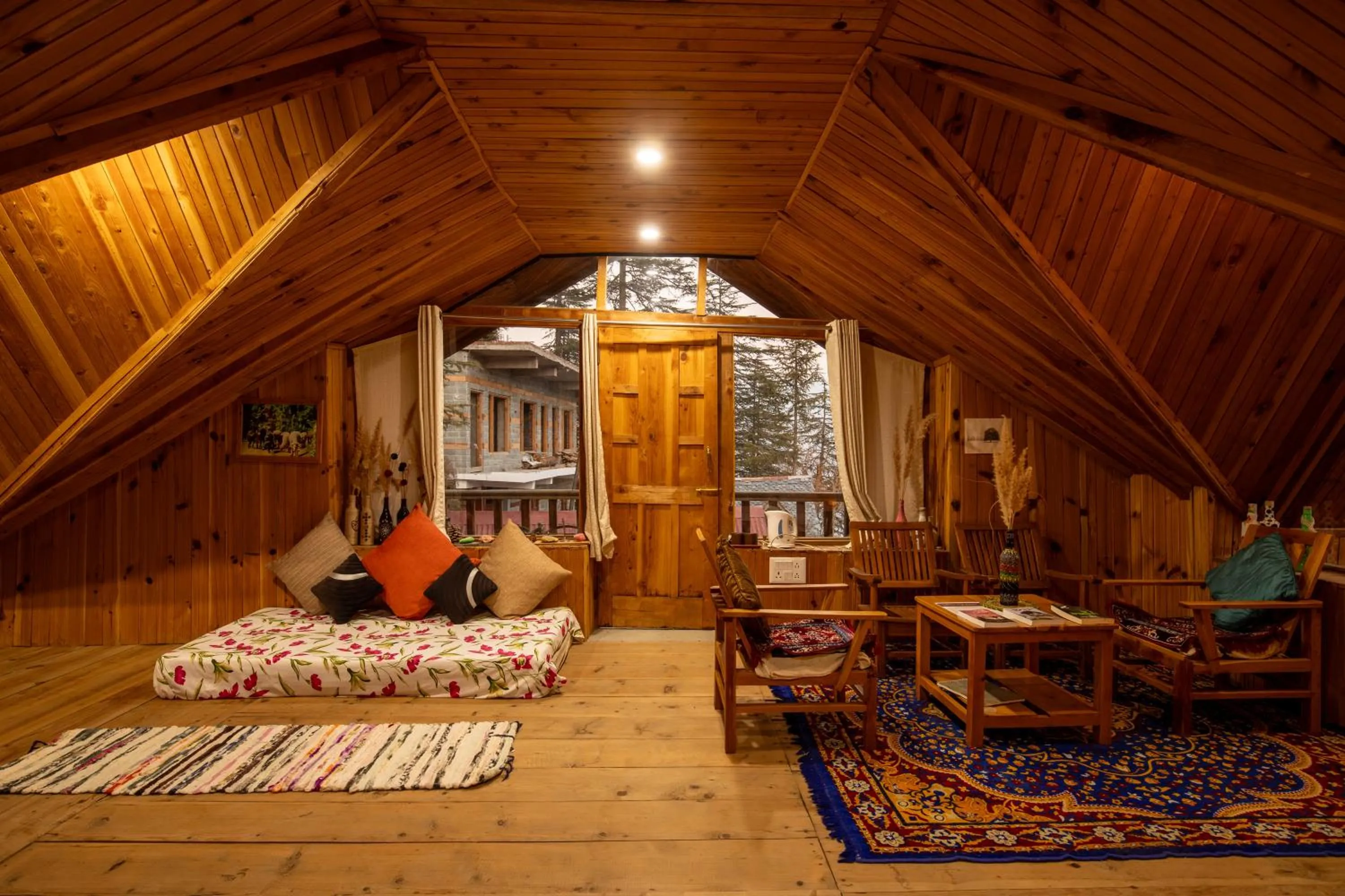 Bed in Ishan Log Huts-A boutique home stay