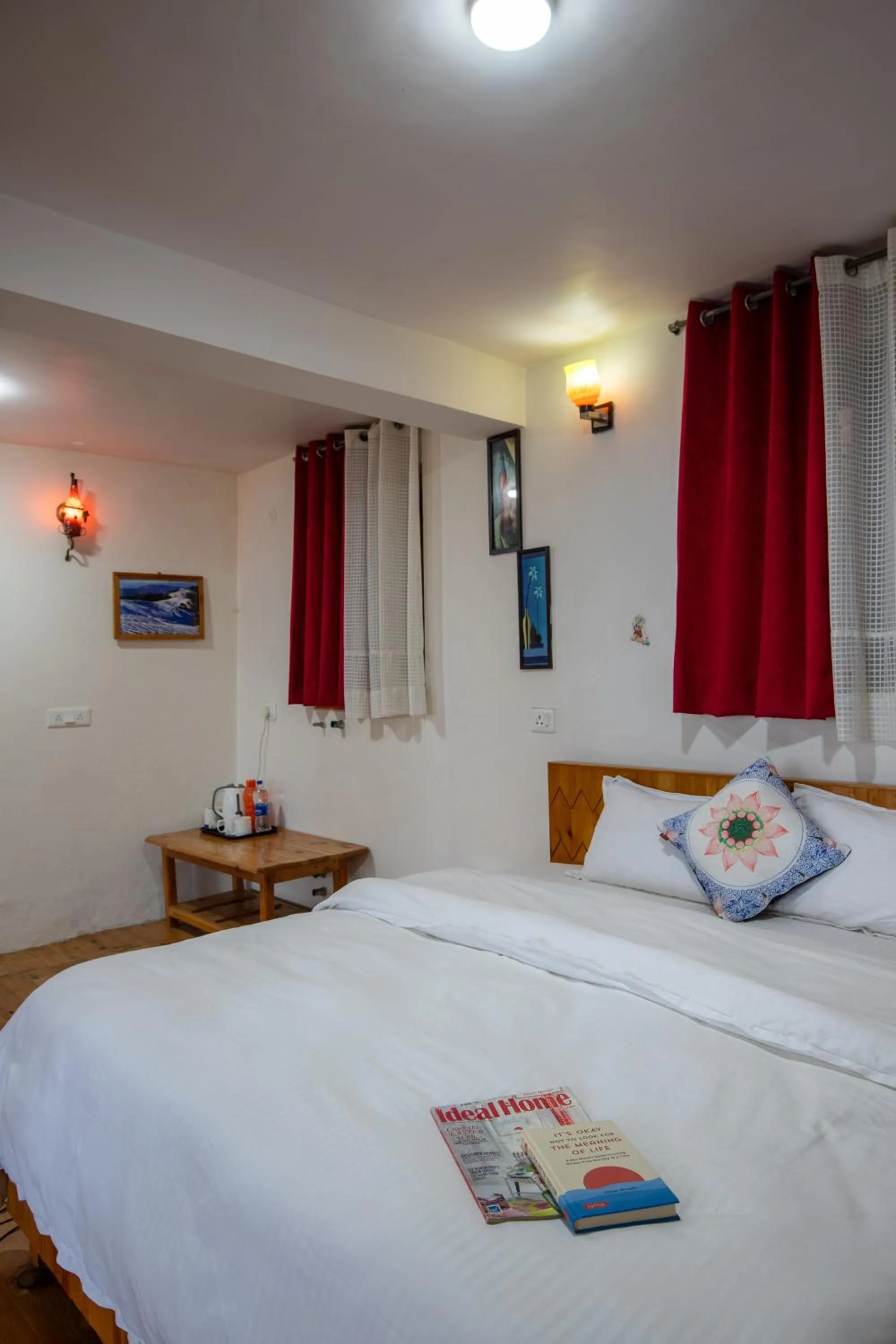 Bed in Ishan Log Huts-A boutique home stay