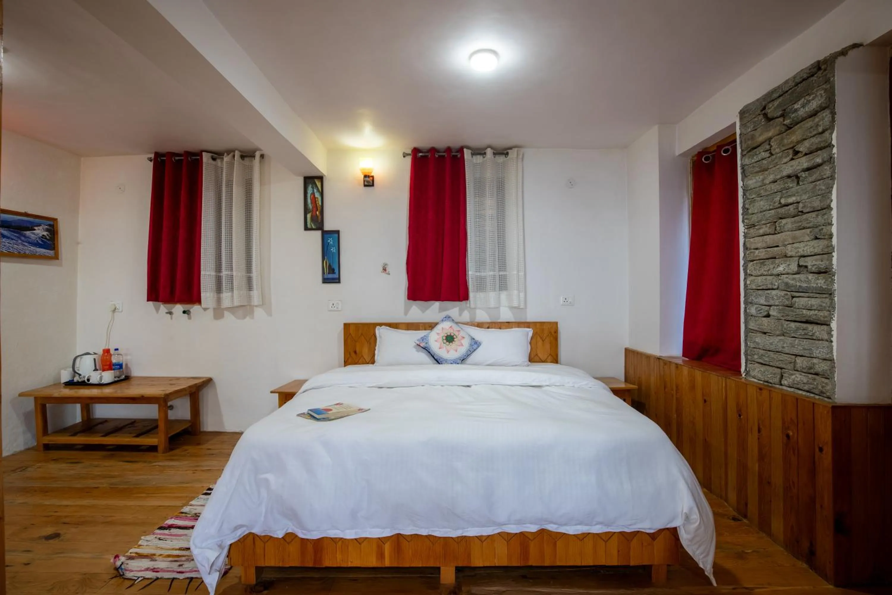 Bed in Ishan Log Huts-A boutique home stay