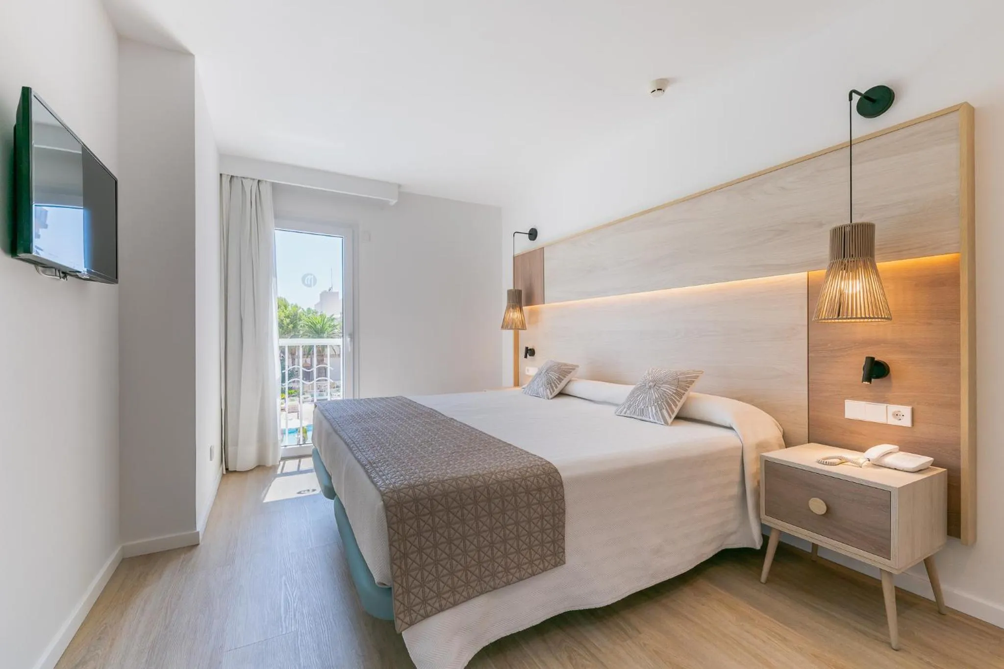 Bed in Leman Hotel y Apartamentos