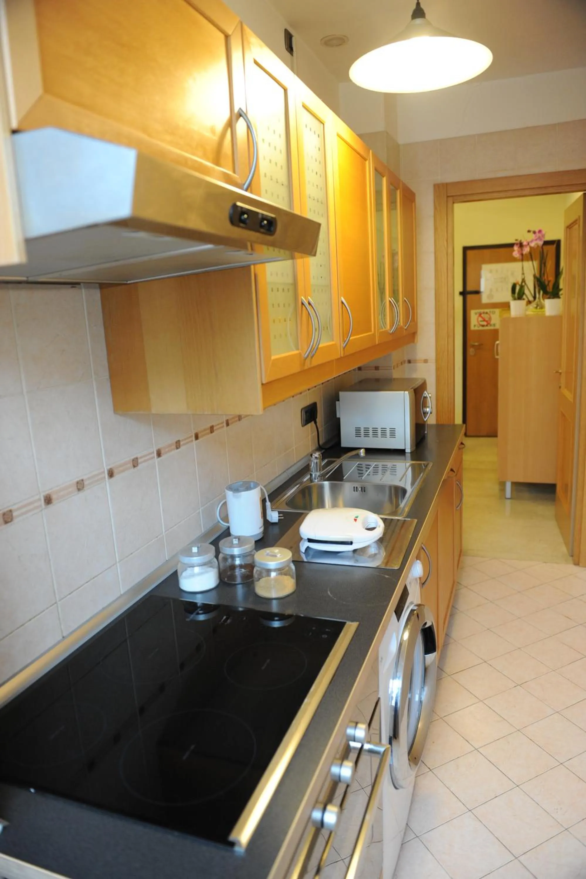 Kitchen or kitchenette in Lux Appartamenti