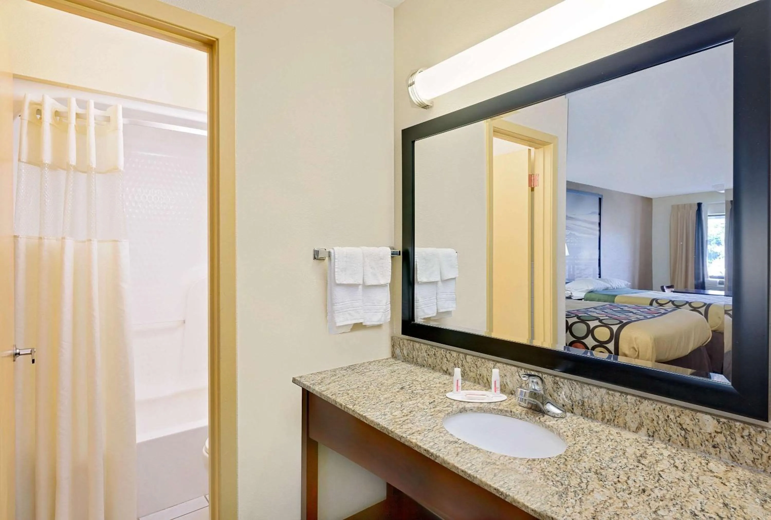 Bathroom, Bed in Super 8 by Wyndham Laurel