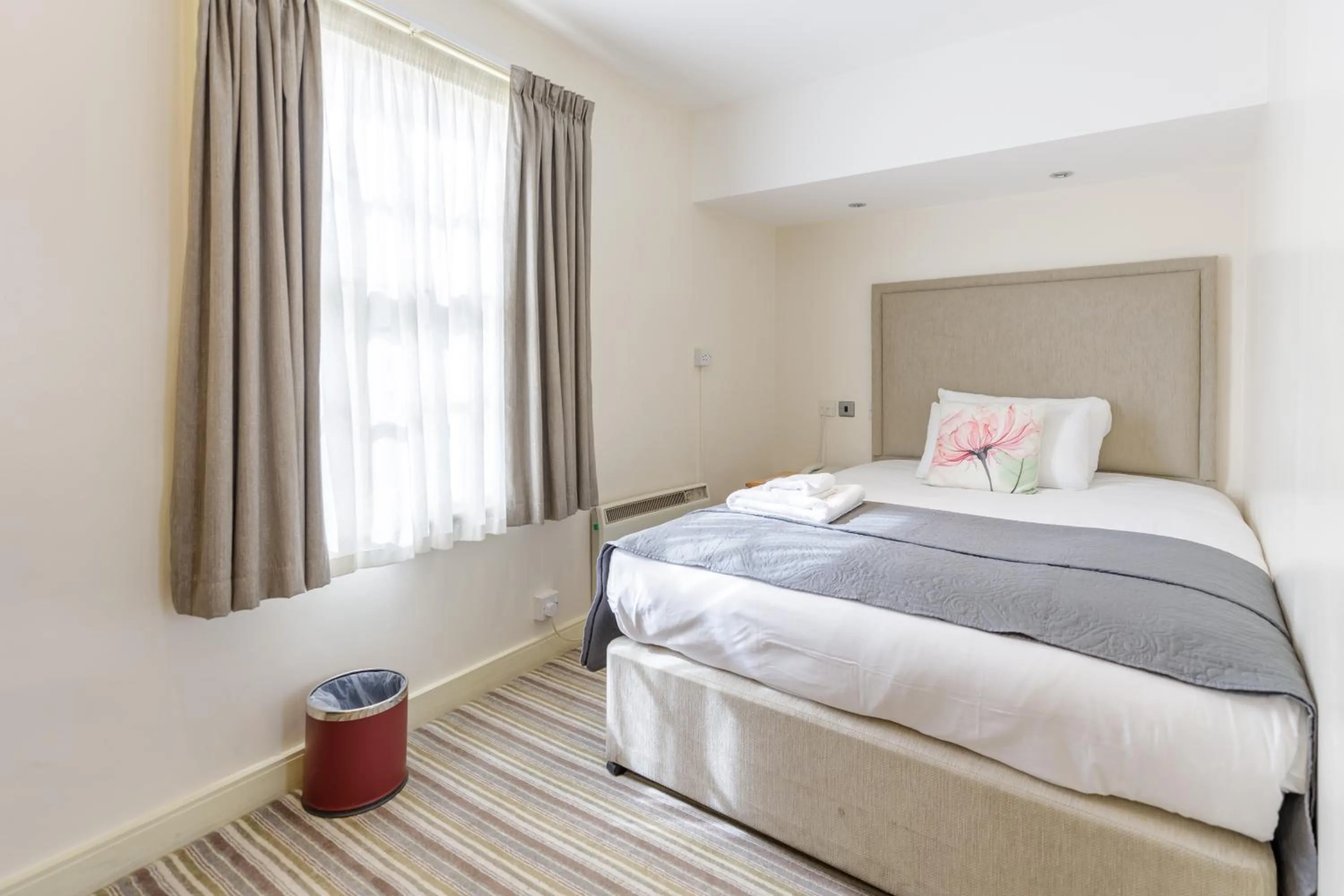 Bed in Swan Revived Hotel