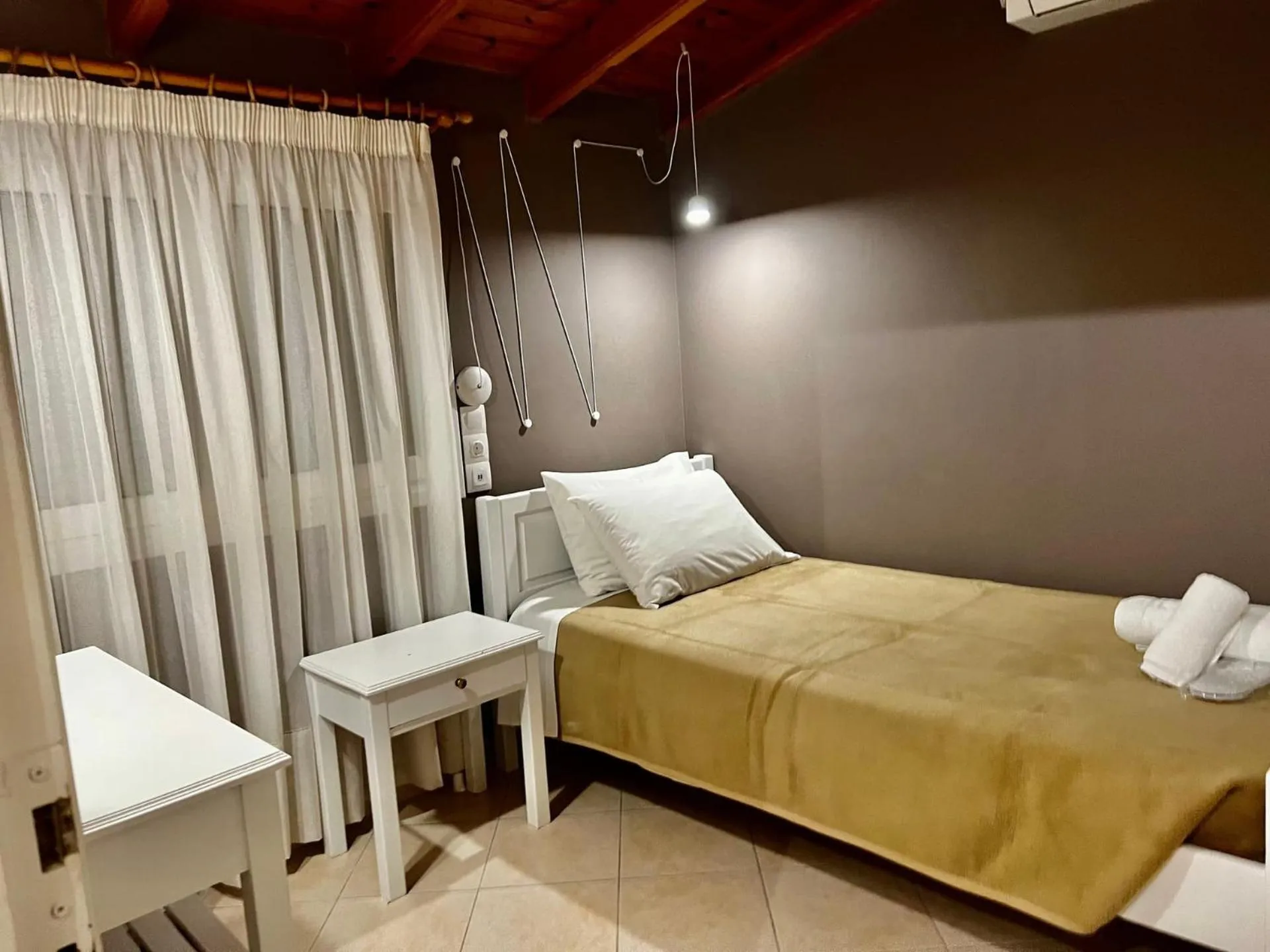 Bedroom in IONIAN SUITES by Bruskos