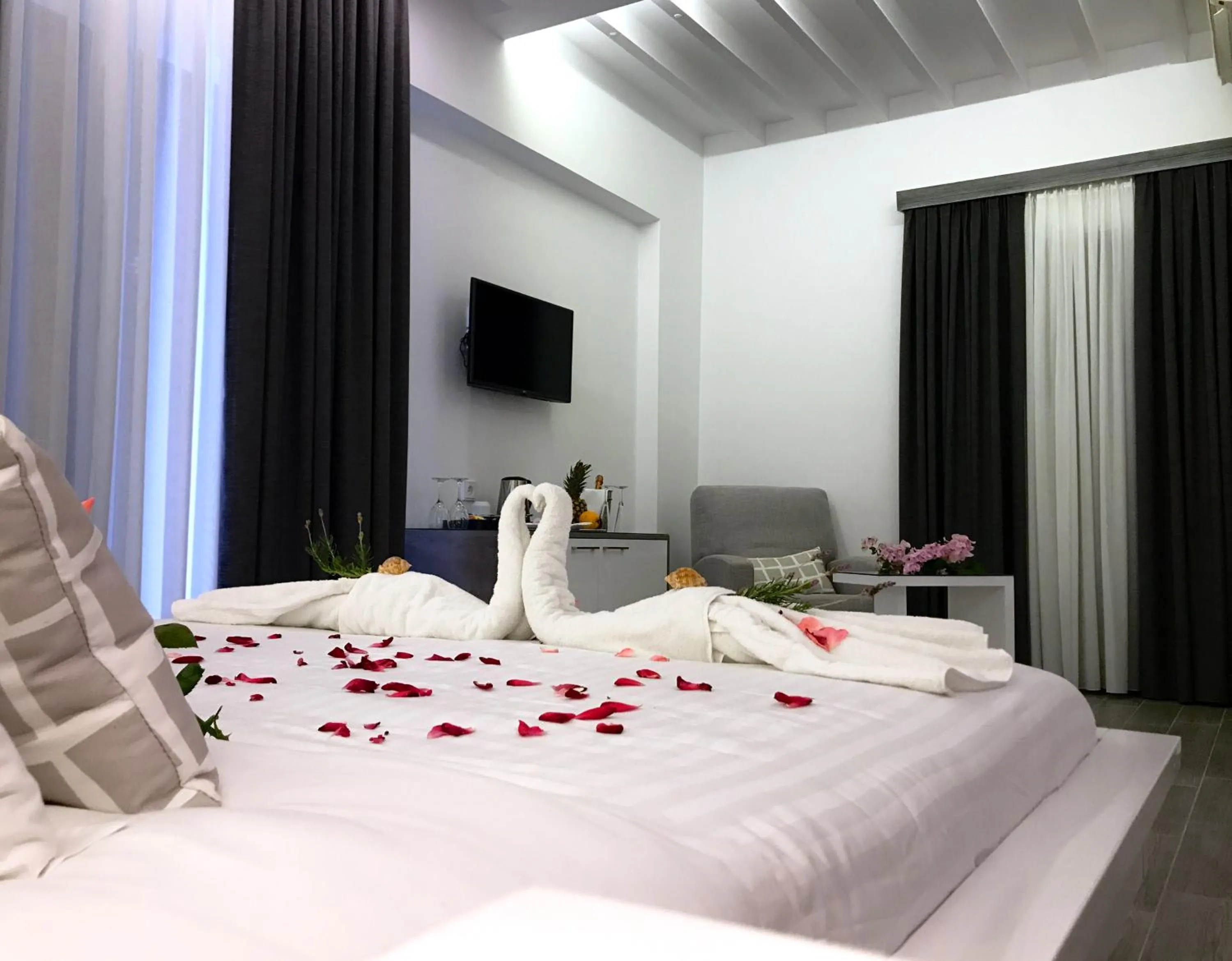 Bed in IONIAN SUITES by Bruskos