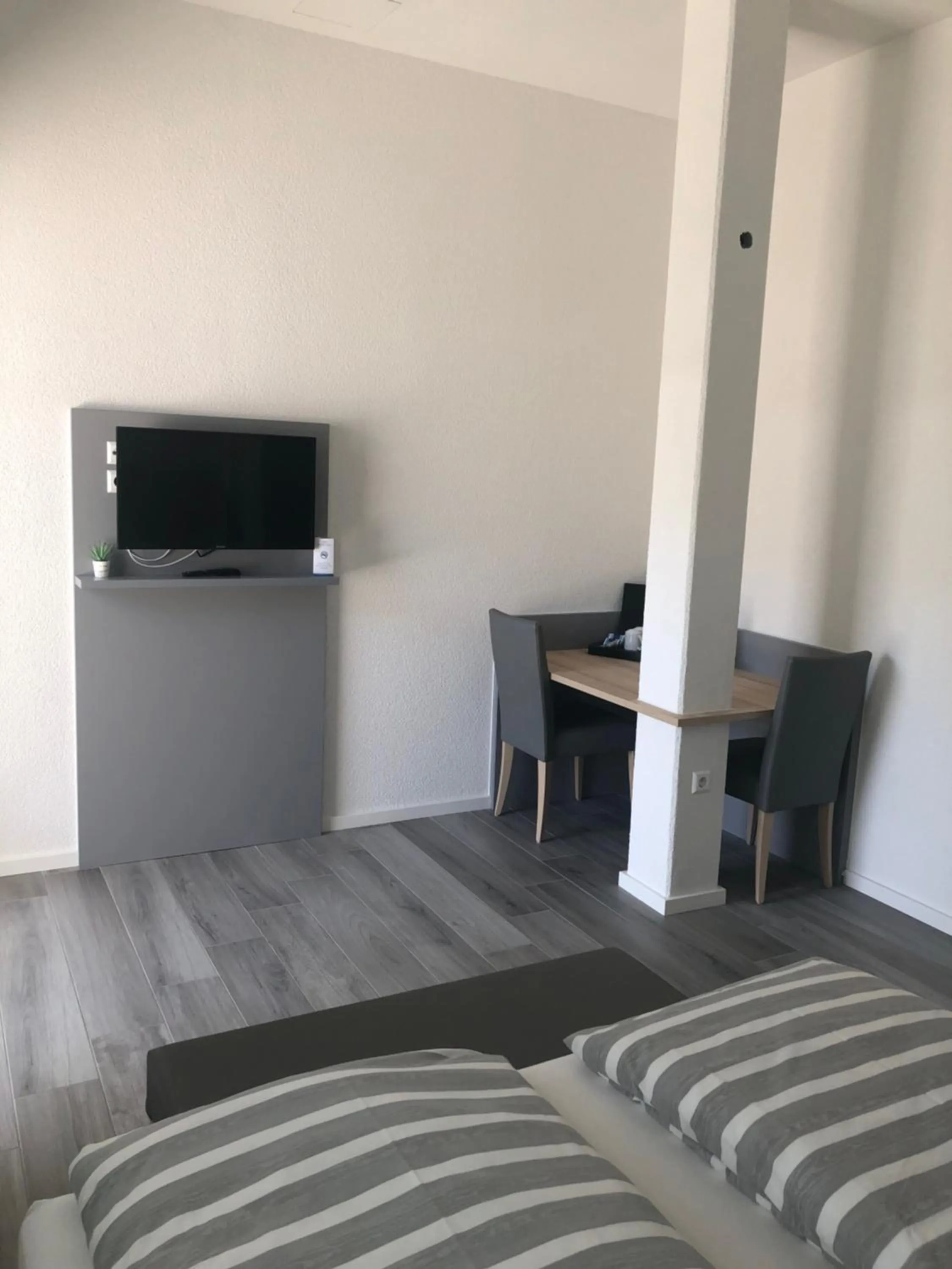 Dining area, Bed in Hotel Lumi