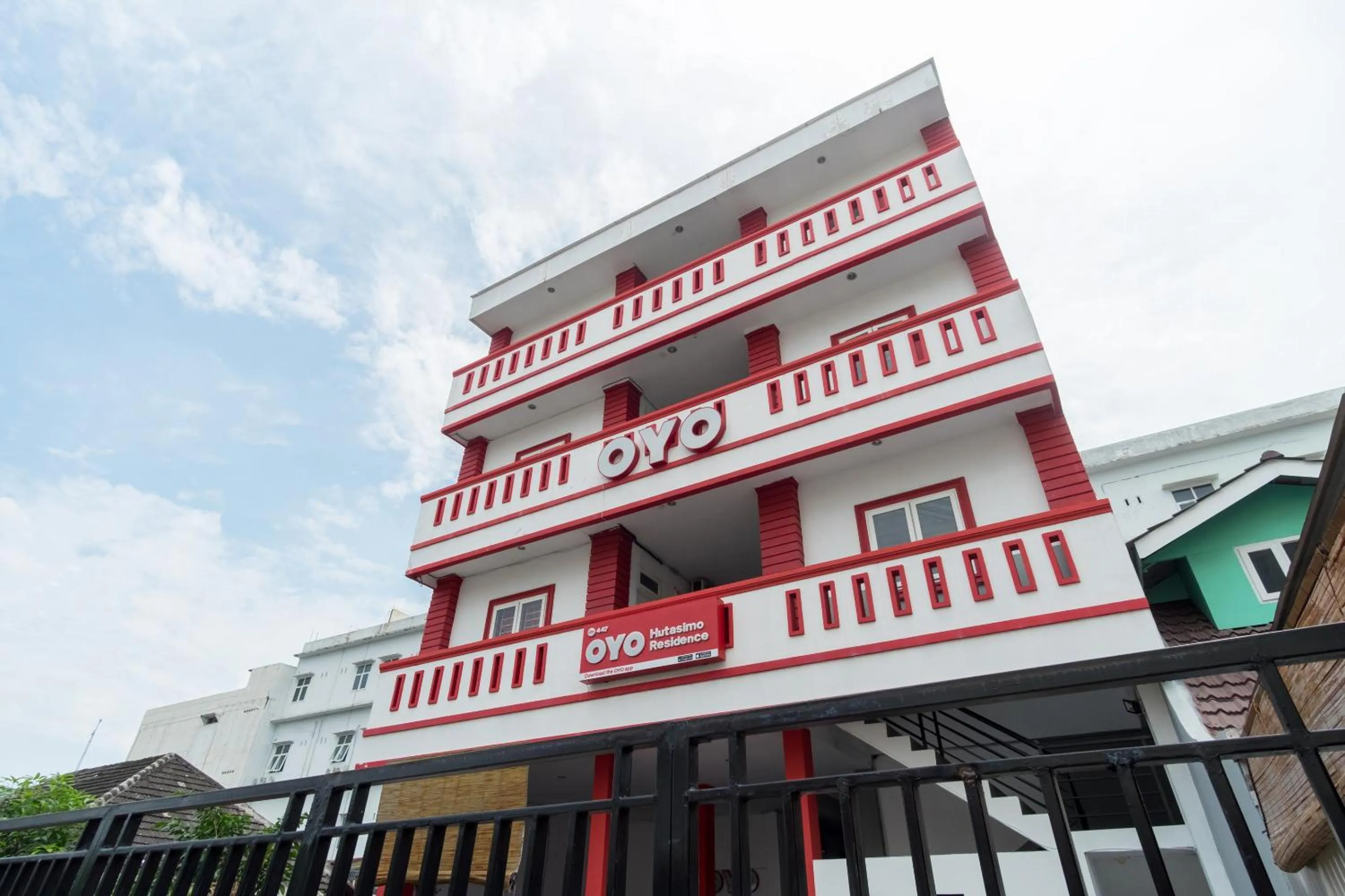 Facade/entrance, Property Building in OYO 447 Hutasimo Residence