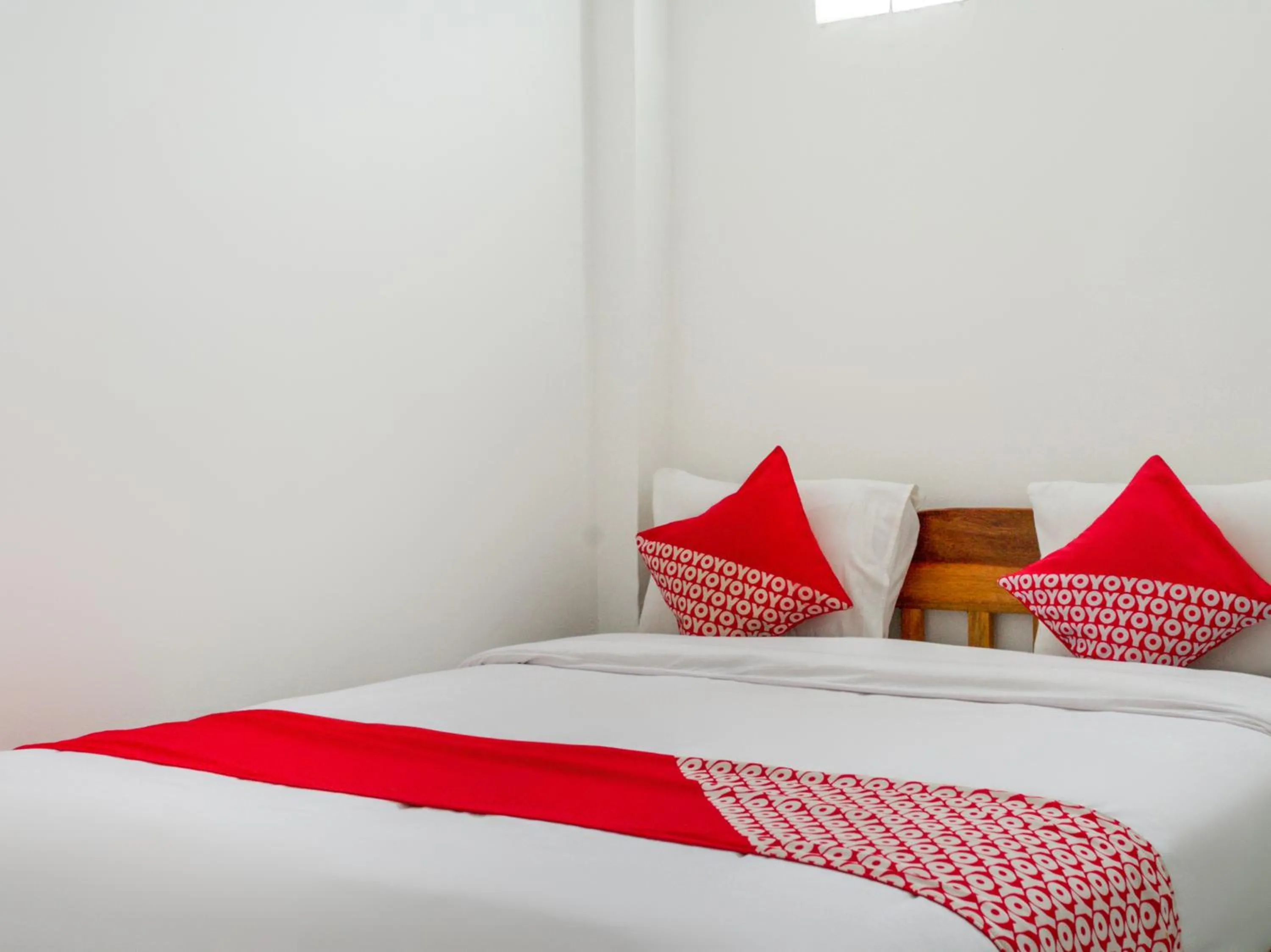 Bedroom in OYO 447 Hutasimo Residence