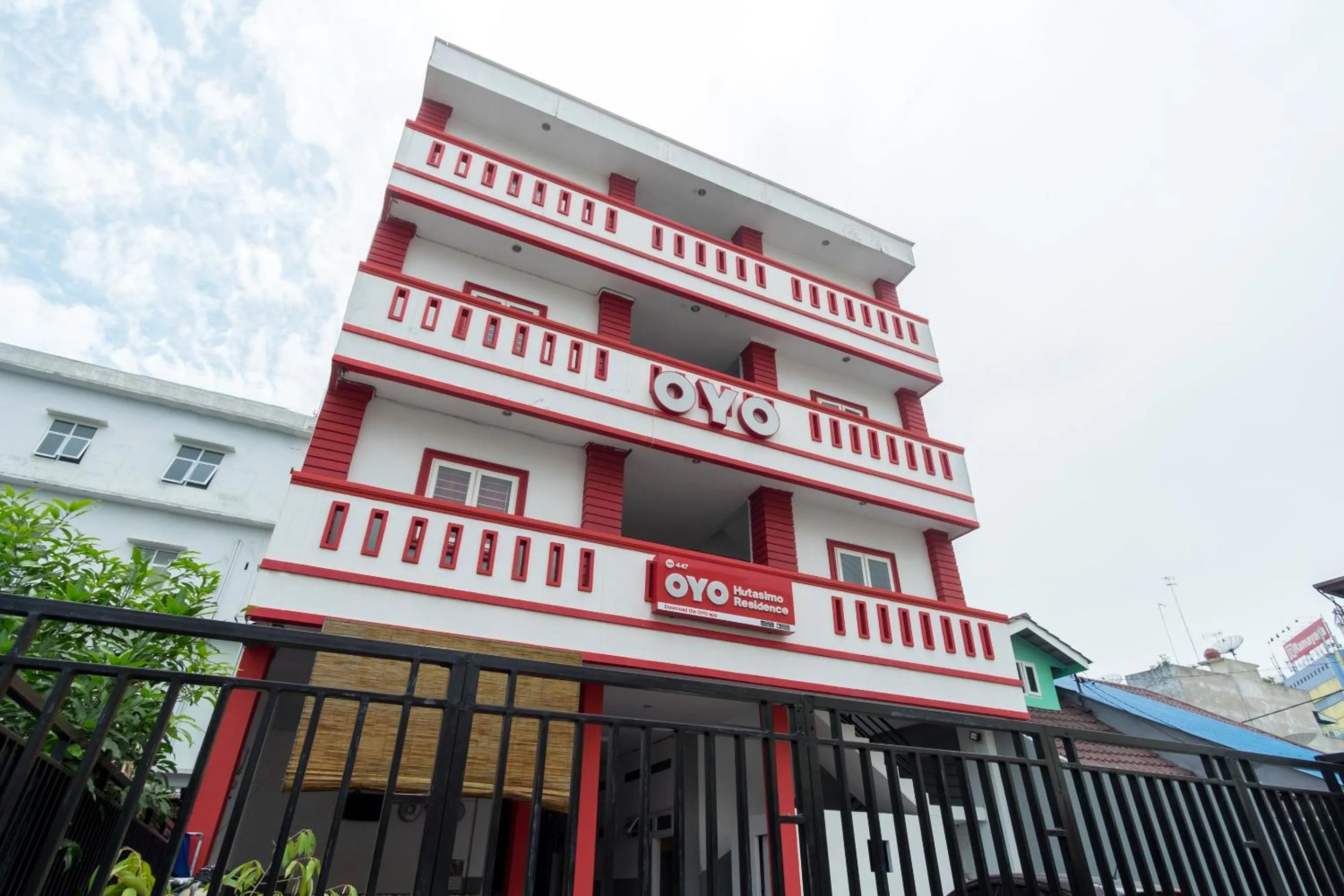 Facade/entrance, Property Building in OYO 447 Hutasimo Residence