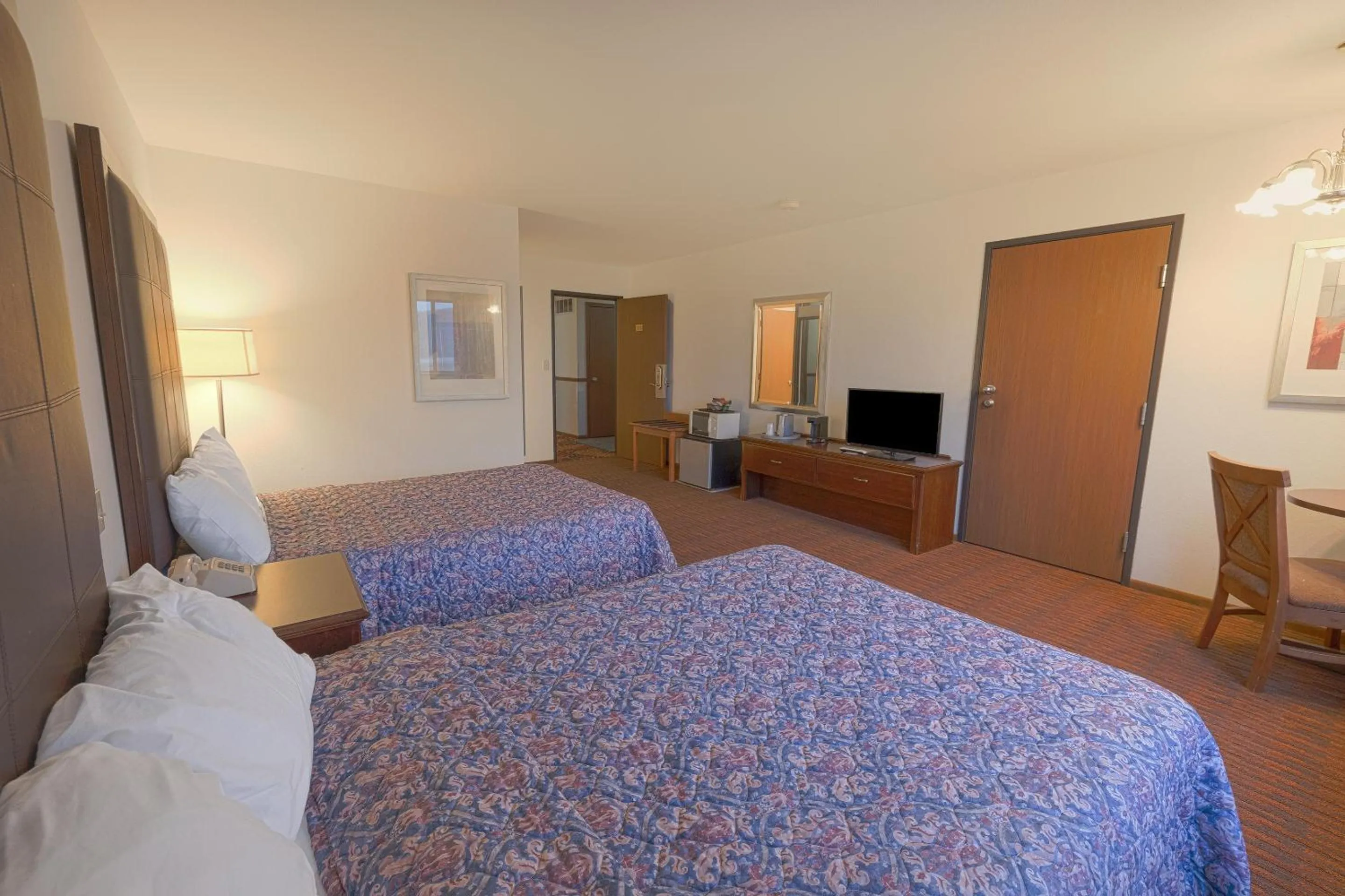 Bedroom, Bed in Harlan Inn and Suites By OYO Harlan