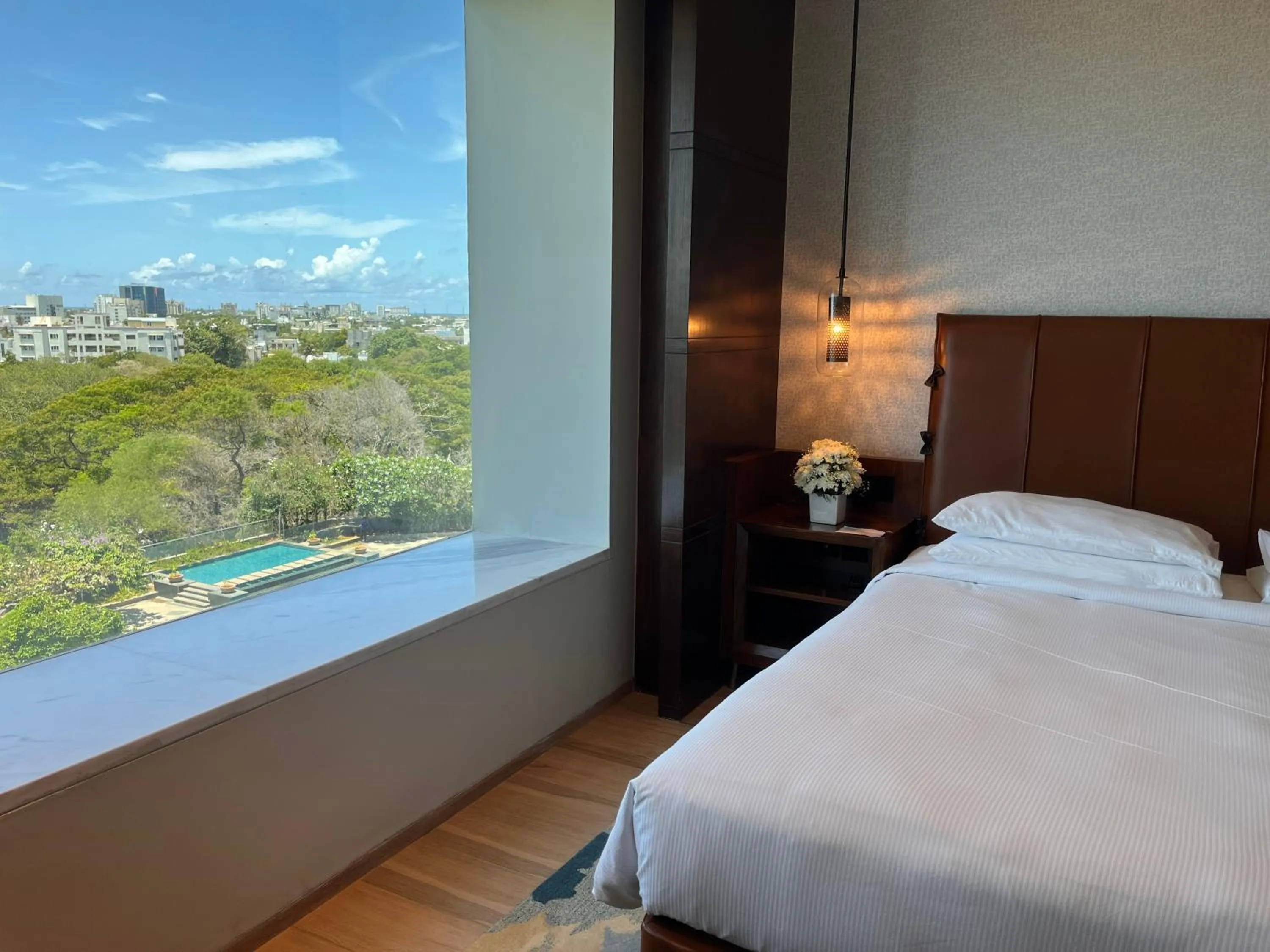 Pool view, Bed in Hyatt Regency Chennai
