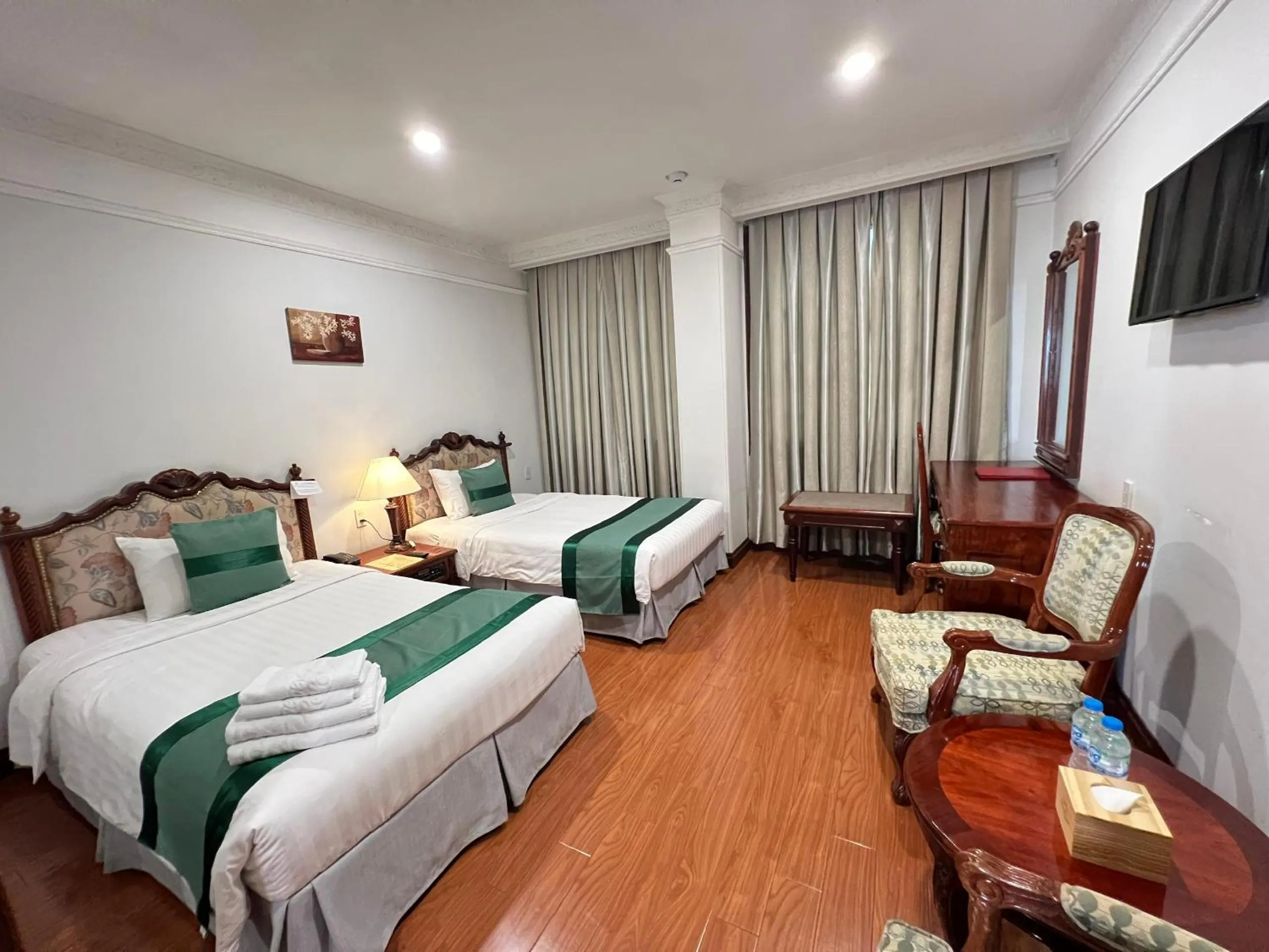 Bed in Riverside Hotel Saigon