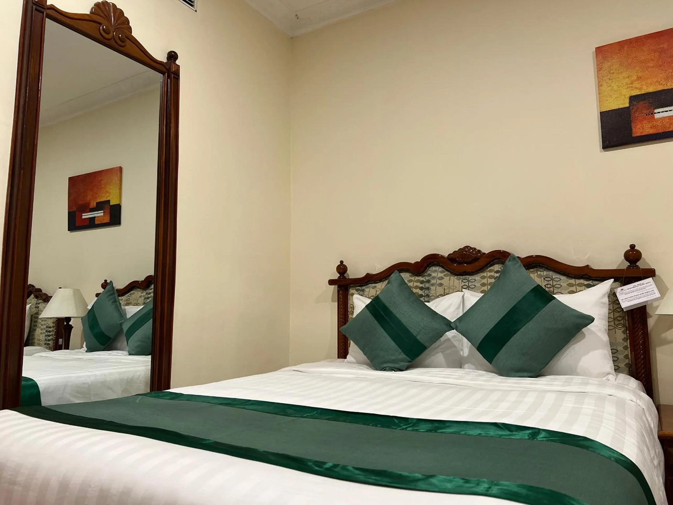 Bed in Riverside Hotel Saigon