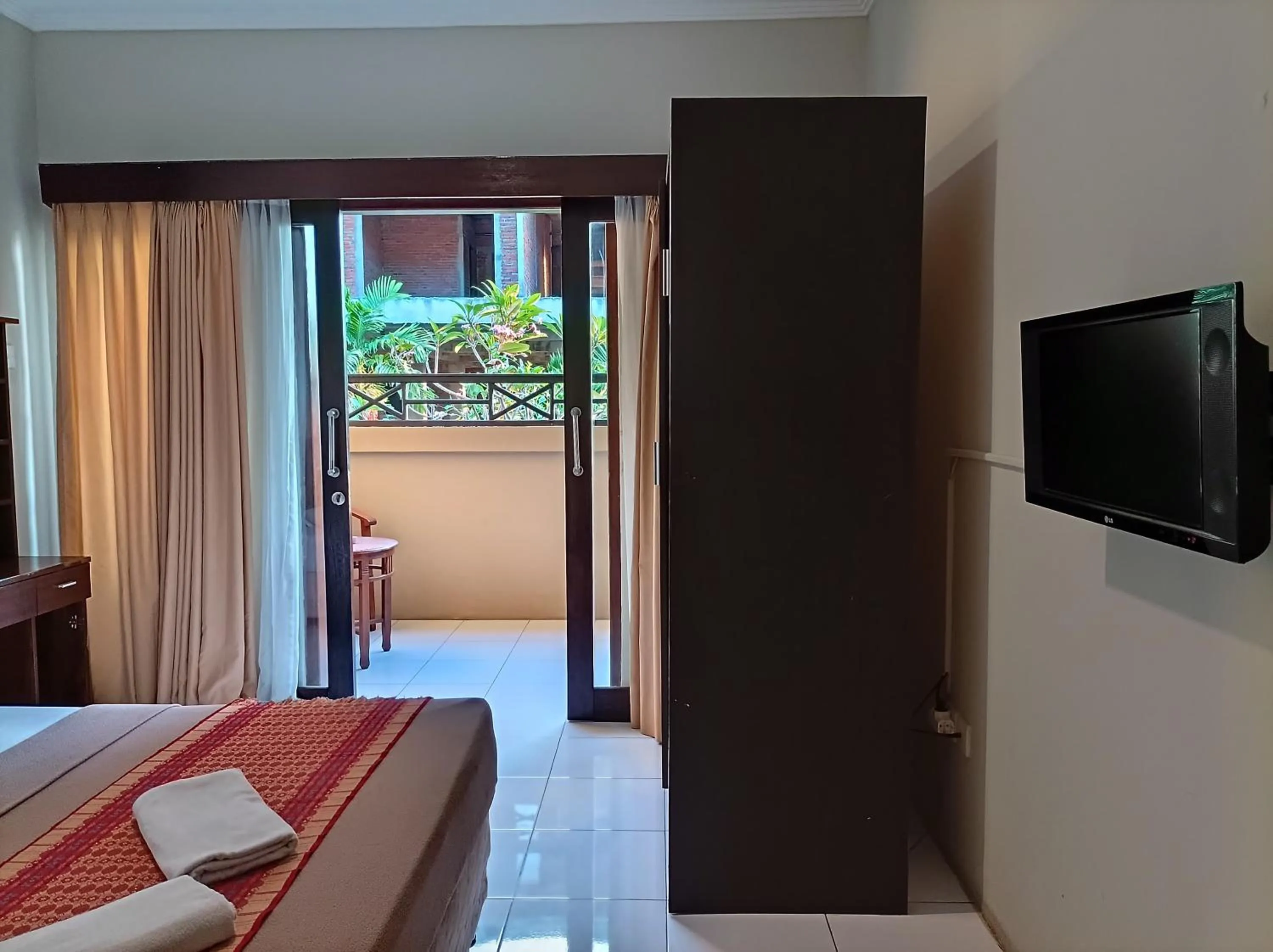 TV and multimedia, Bed in Sapta Petala Hotel