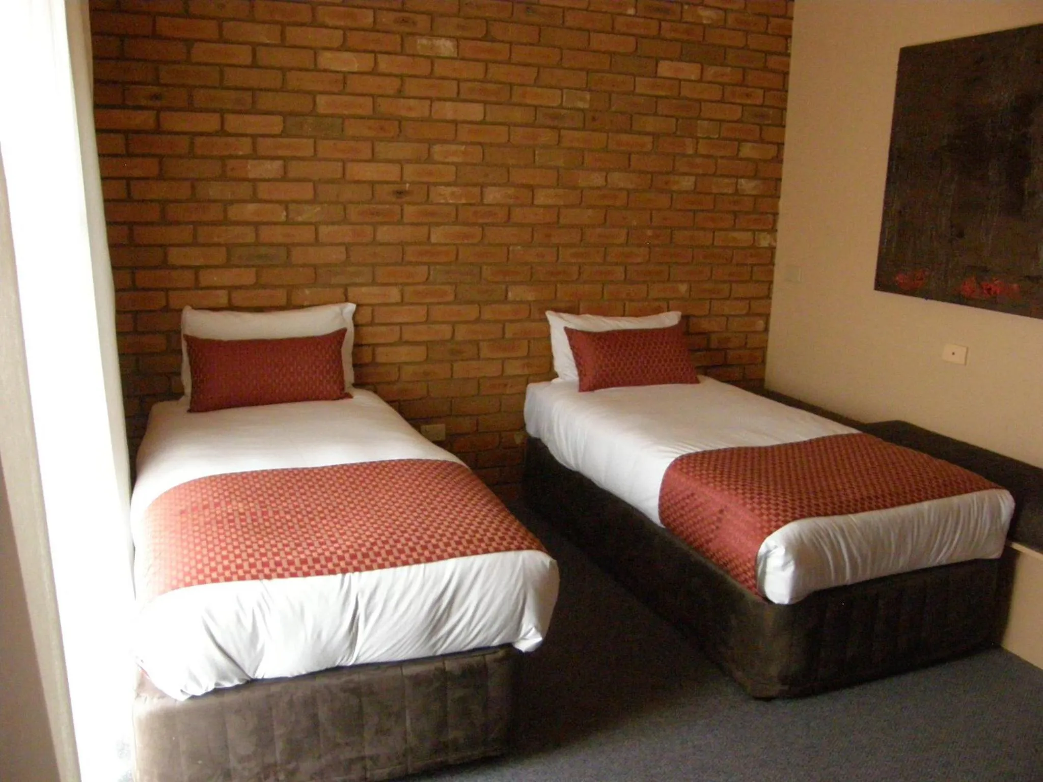 Bed in Quality Inn Colonial